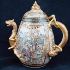Japanese Meiji Satsuma Finely Decorated and Gilded Dragon Handle Scenic Teapot