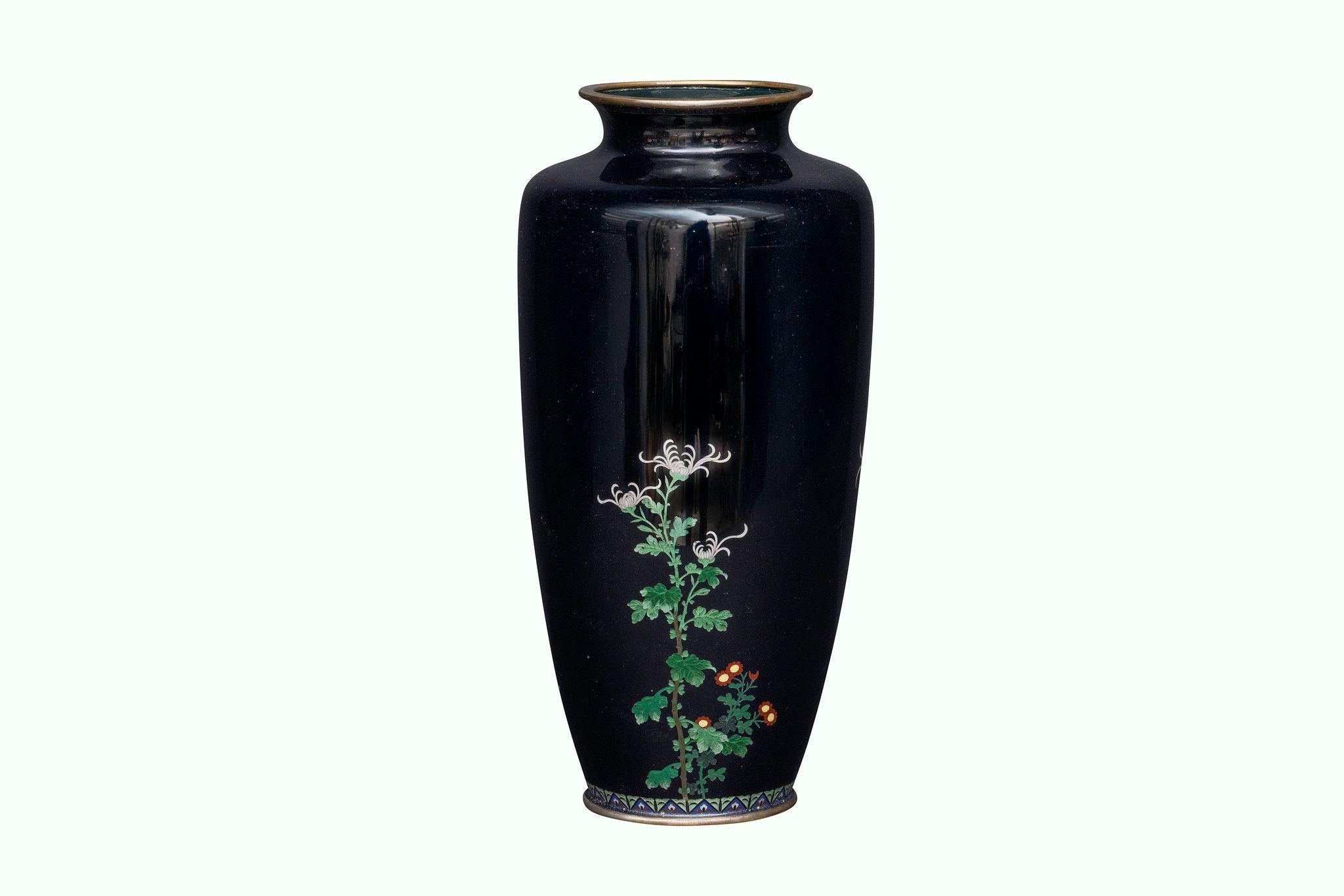 A Japanese Meiji Period Silver-Wire Cloisonné Enamel Vase with Chrysanthemums on a Midnight Ground, Attributed to Inaba

A magnificent Japanese cloisonné enamel vase from the Meiji period, attributed to the celebrated Inaba workshop, distinguished