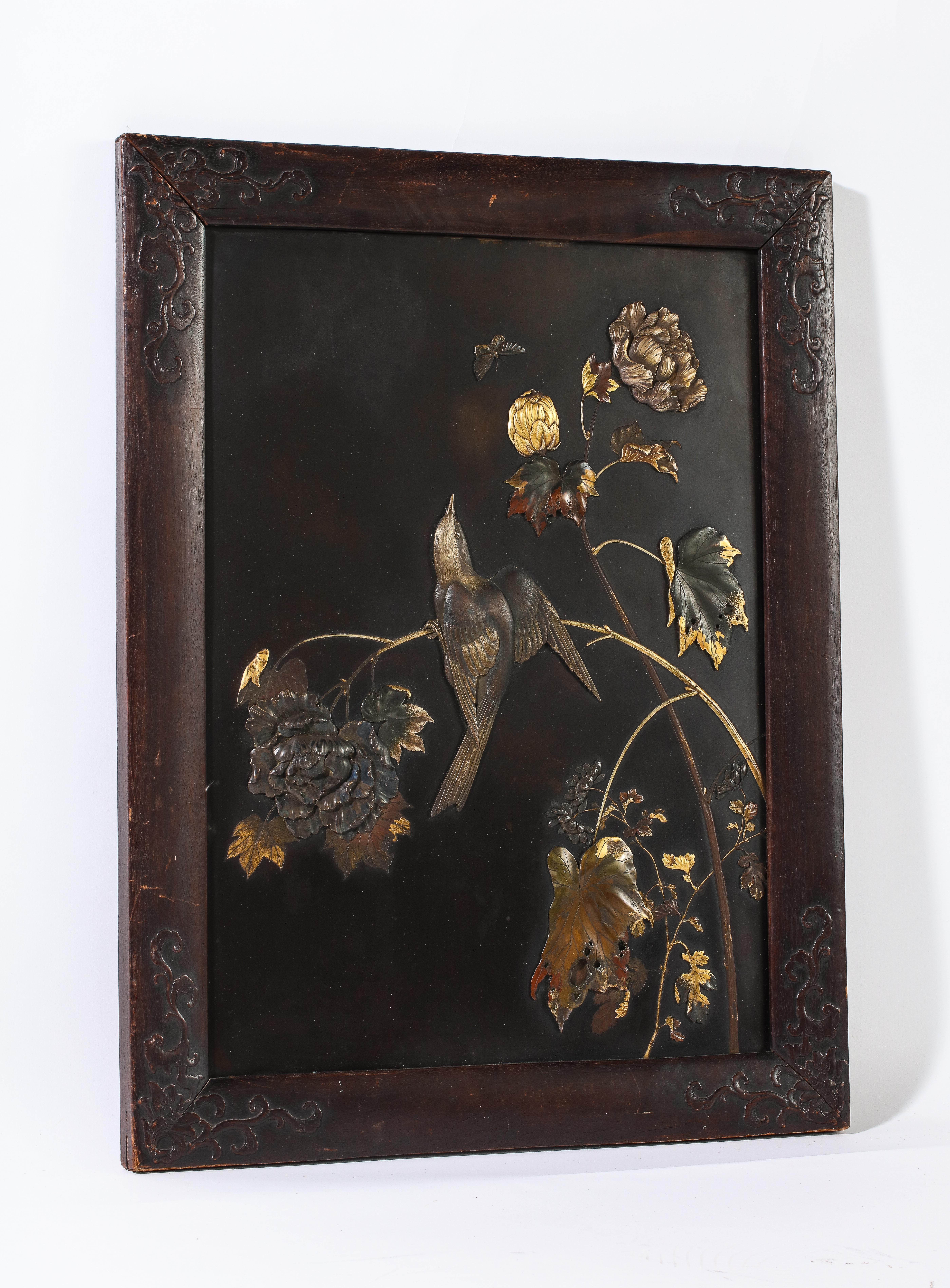 A large, fine quality, and world class Japanese Meiji period mixed metal plaque with Shakudo-inlay, silver-inlay, gold-inlay, copper-inlay, and patina, attributed to the famous Suzuki Chokichi (Kaka). This plaque is of a very large size, however, it