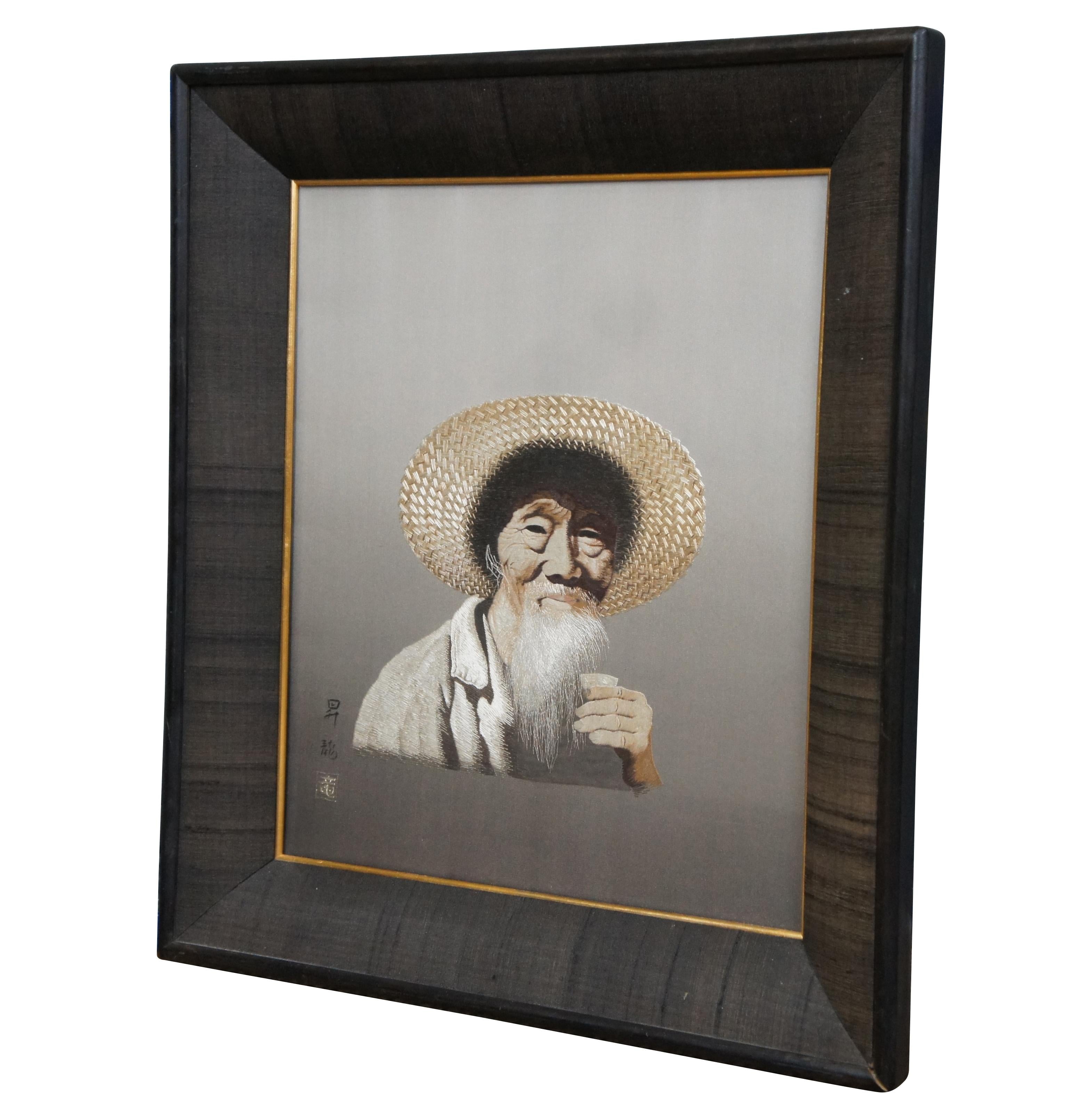 Astonishingly realistic midcentury Japanese embroidered Uchida silk stitched chinoiserie portrait of an old man in a hat, lifting a sake cup. Signed lower right. Translation: ?? is the name, meaning 