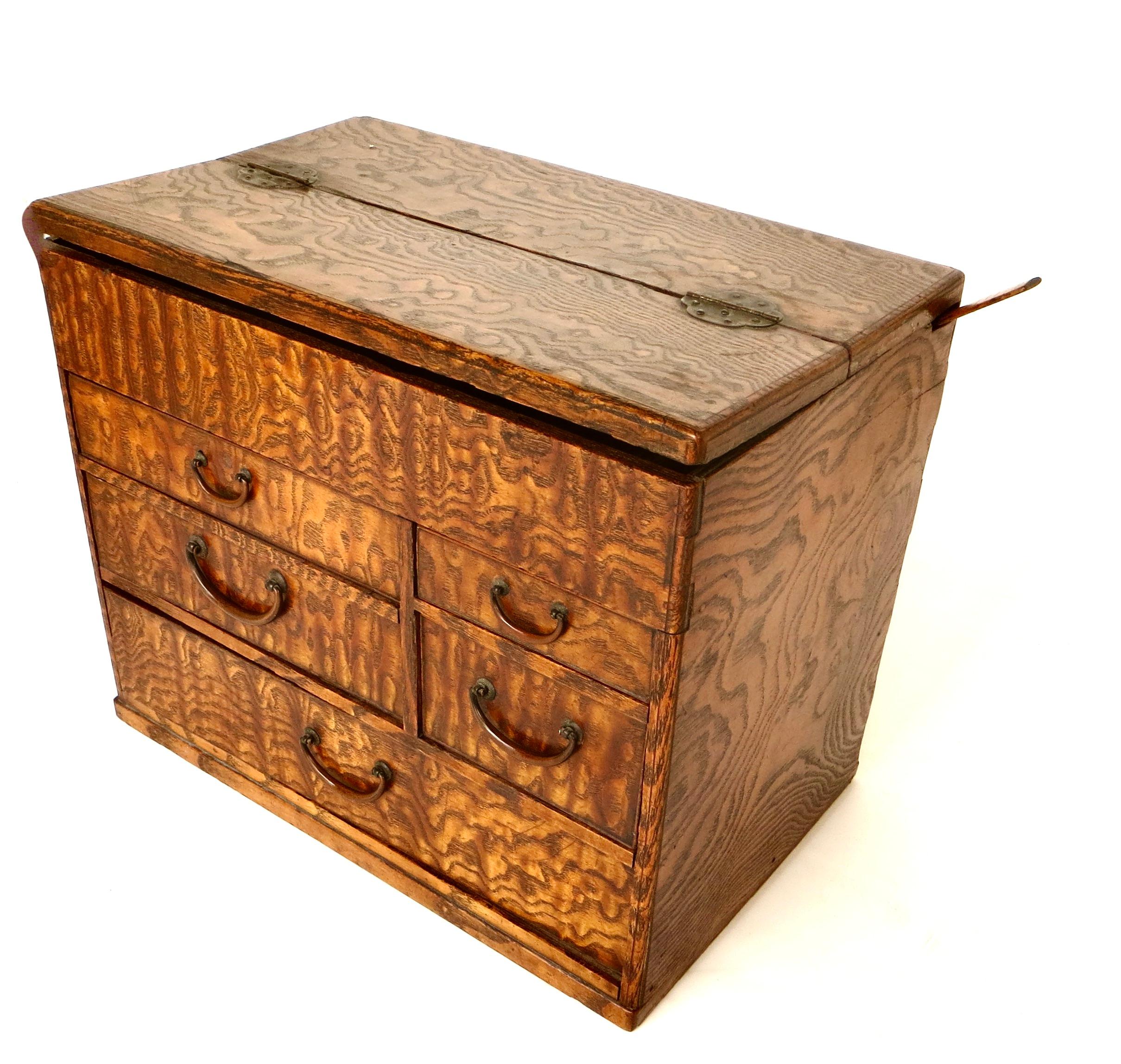 Circa 1920 (Taisho period) this Japanese sewing work box is made of highly figured mulberry wood and of the most beautiful grain and fine quality workmanship; in un-restored and excellent all original condition ; most significantly; it has the