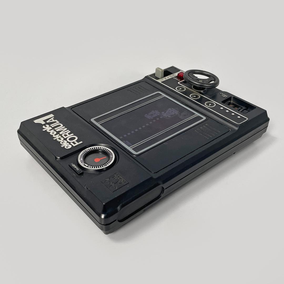 Modern Japanese modern black plastic videogame Formula 1 by Tomy Electronic, 1978 For Sale