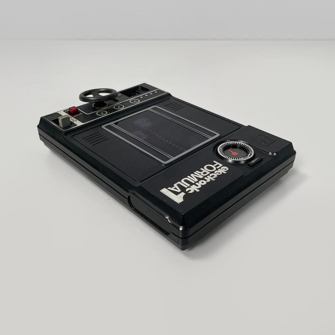 Japanese modern black plastic videogame Formula 1 by Tomy Electronic, 1978 In Good Condition For Sale In MIlano, IT