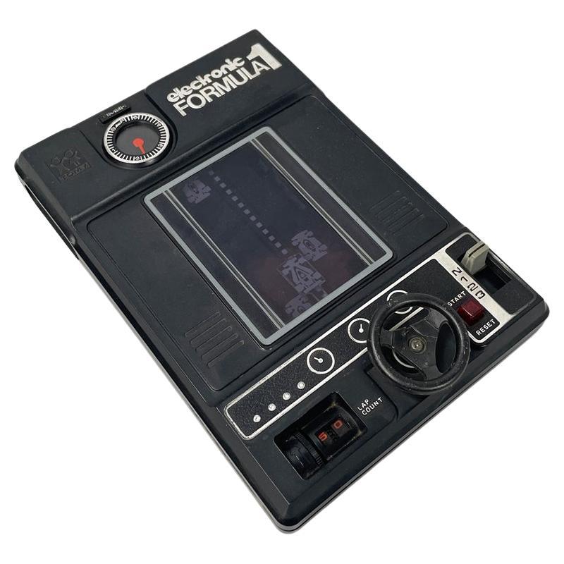 Japanese modern black plastic videogame Formula 1 by Tomy Electronic, 1978 For Sale