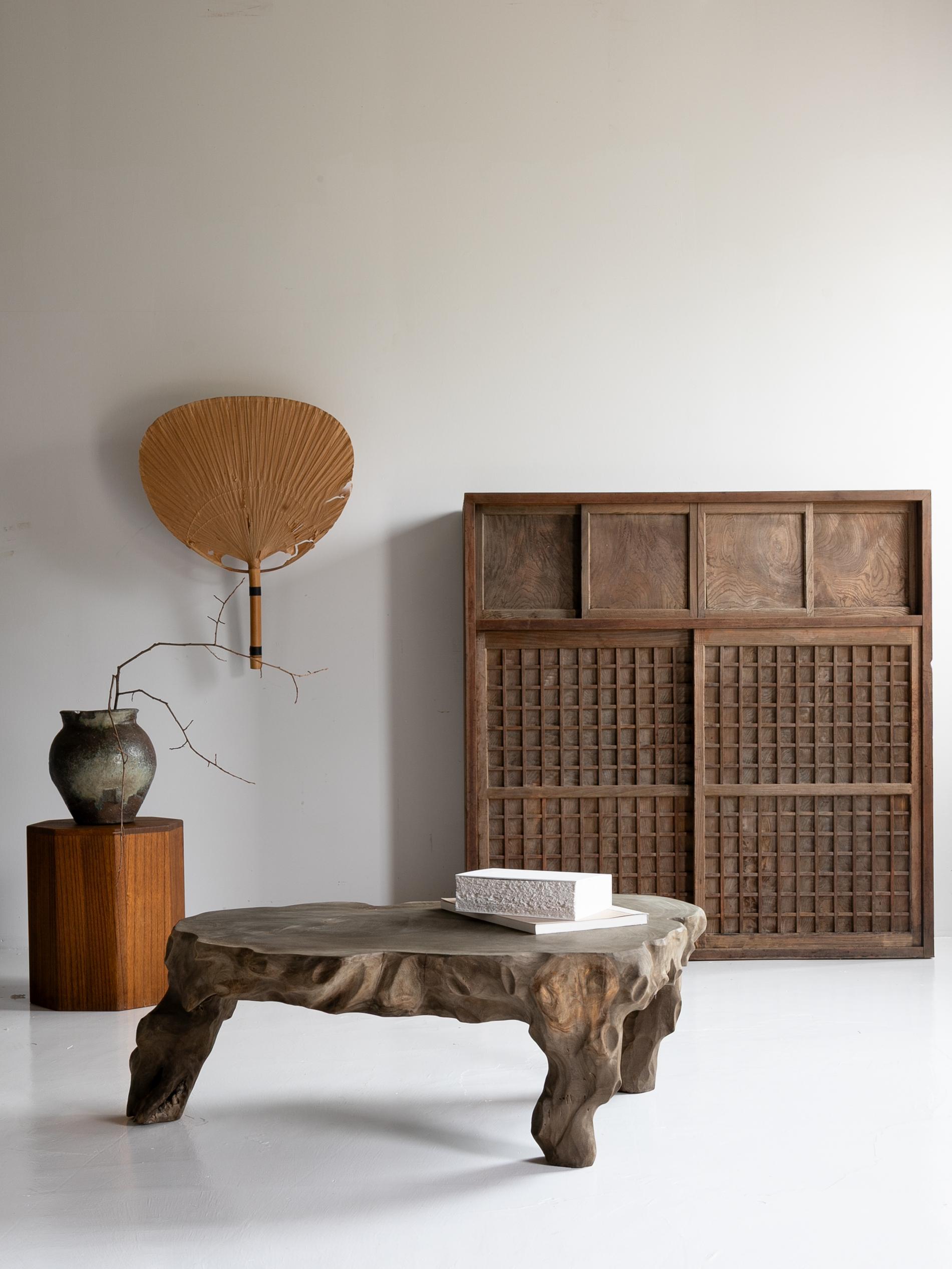 This is a old  modern-style Tansu (Japanese chest) made in Japan.
It dates from the late Meiji to Taisho period (1860s–1920s).
The materials used are cedar and zelkova (keyaki) wood.

The sliding lattice doors are crafted using a special technique