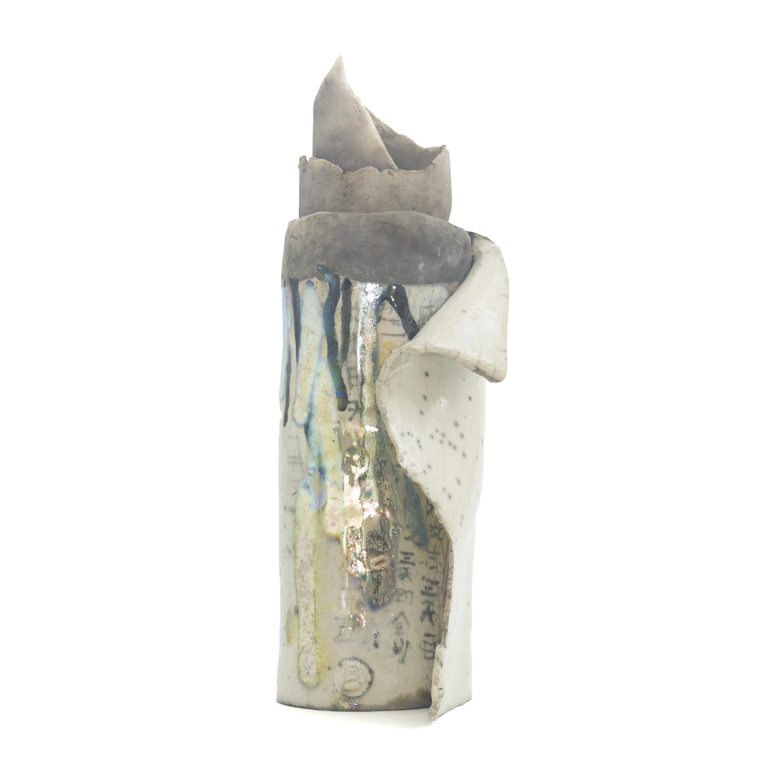 Civilta' Sculpture

Symbol of a lost civilization, this stupefying ceramic sculpture was inspired by the idea of a rolled-up papyrus turned into ceramic over time. Its raw flair, revealed by the irregular edges, is counterbalanced by shimmering,