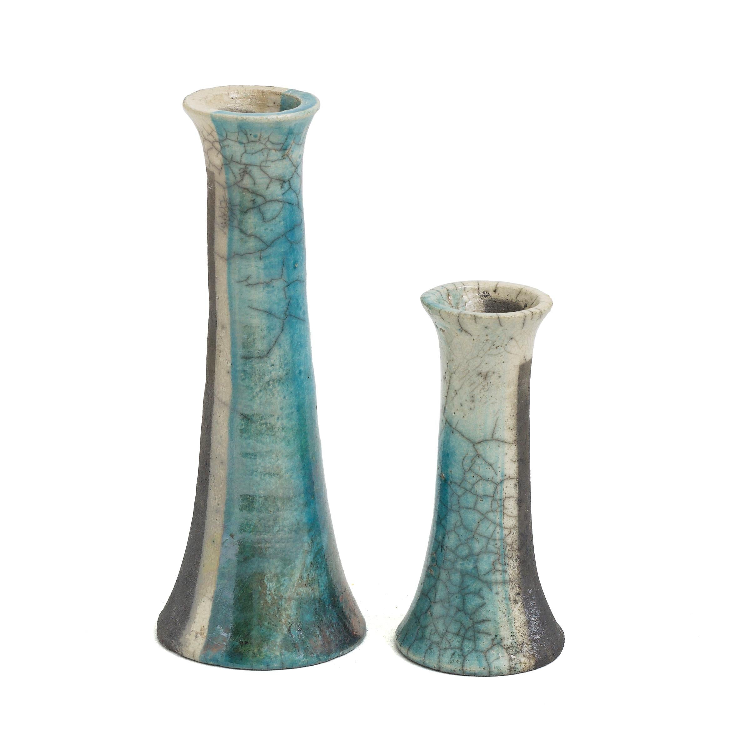 Stelo Wake Candle Holders

Turquoise and crackle' effect are the main colors of these candle holders but the black and burnt effect is present on both the outside of the pieces and the inside of the mouth holding the candles. A symbol of