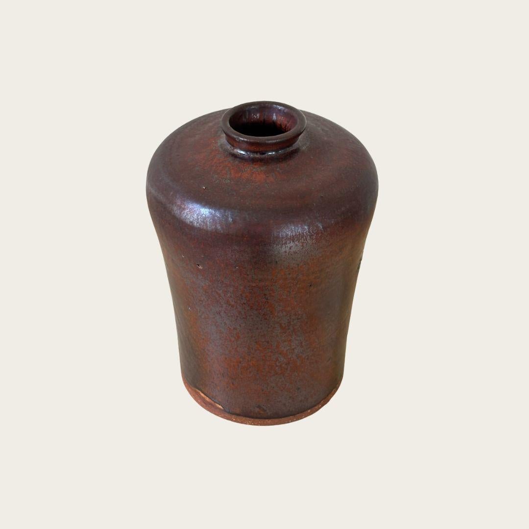 1950s, Japan. Japanese ceramic vase with gunmetal glaze. Artista sconosciuto. Artist signature stamped on underside. Best suited for dried flowers or branches. Does not hold water.