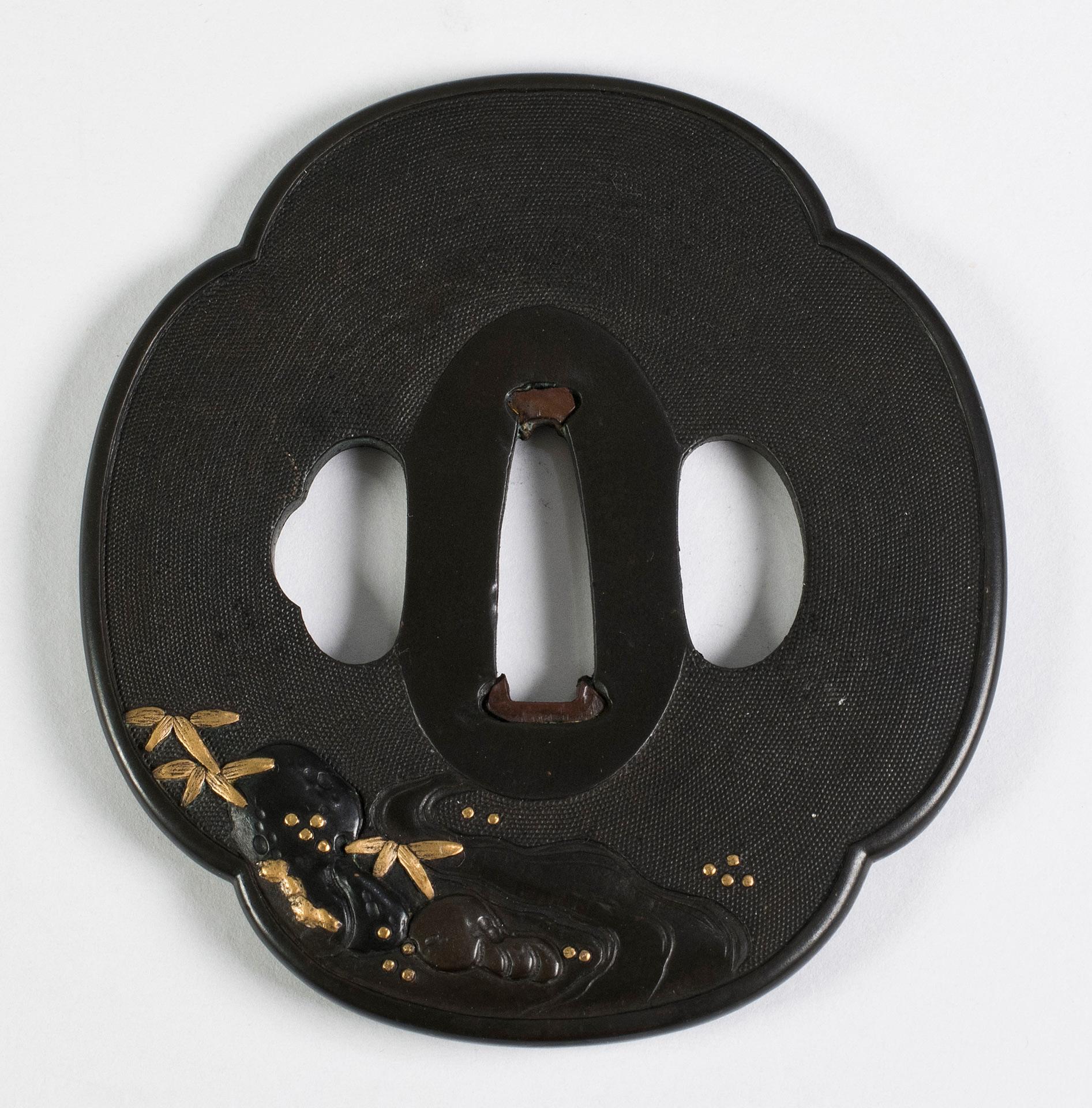 As Part of our Japanese works of art collection we are delighted to offer this fine Edo/Meiji period shakudo and mixed metal tsuba of mokko form , the tsuba finely worked with a nanako stippled ground and depicts a gold Shi Shi dog beneath a silver