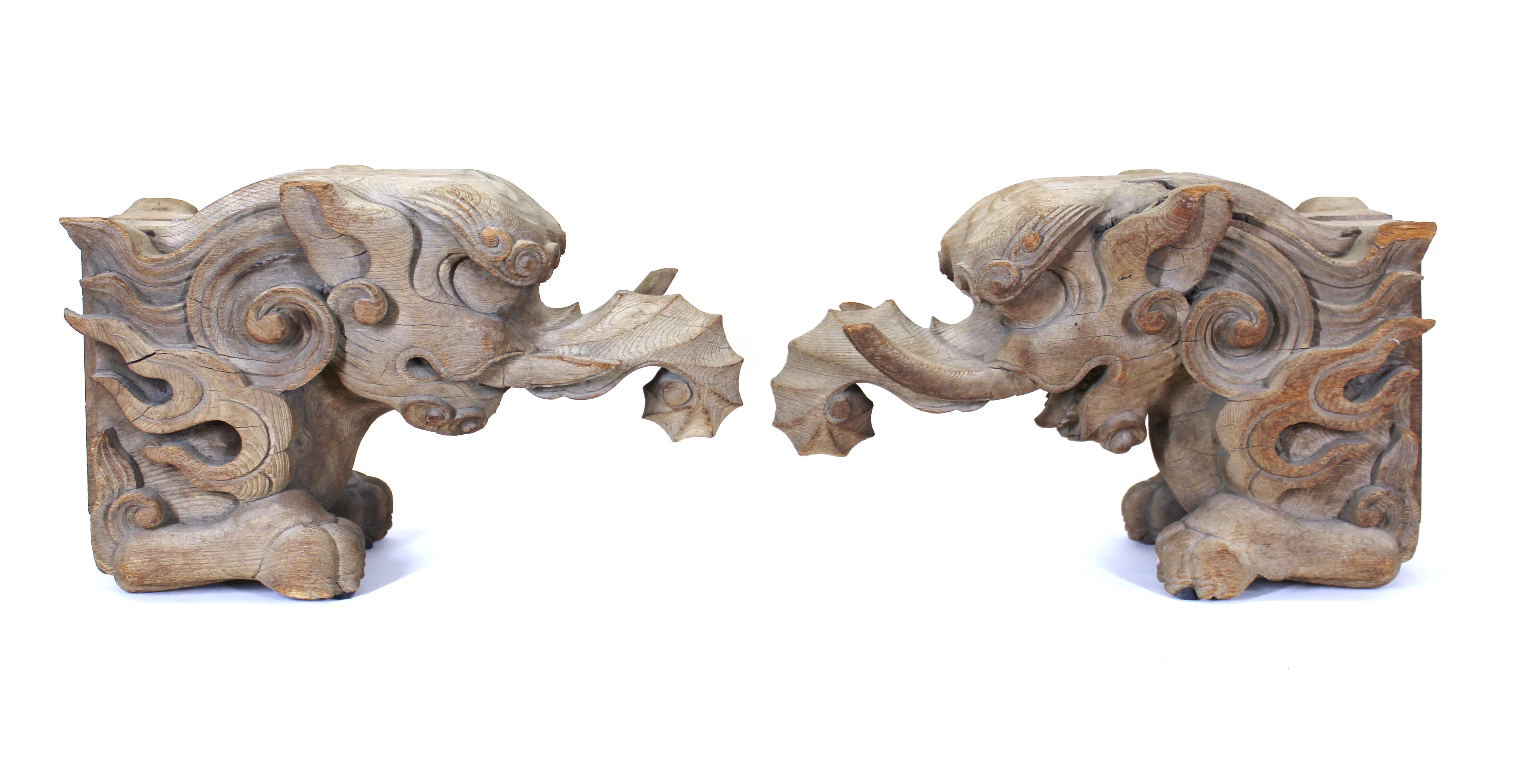 Japanese Momoyama period rare early pair of Baku figures, carved in keyaki wood with an exquisite wood grain, 17th century, circa 1650.
The elephant-like Baku is an imaginary and composite creature from Chinese mythology, thought to prevent or