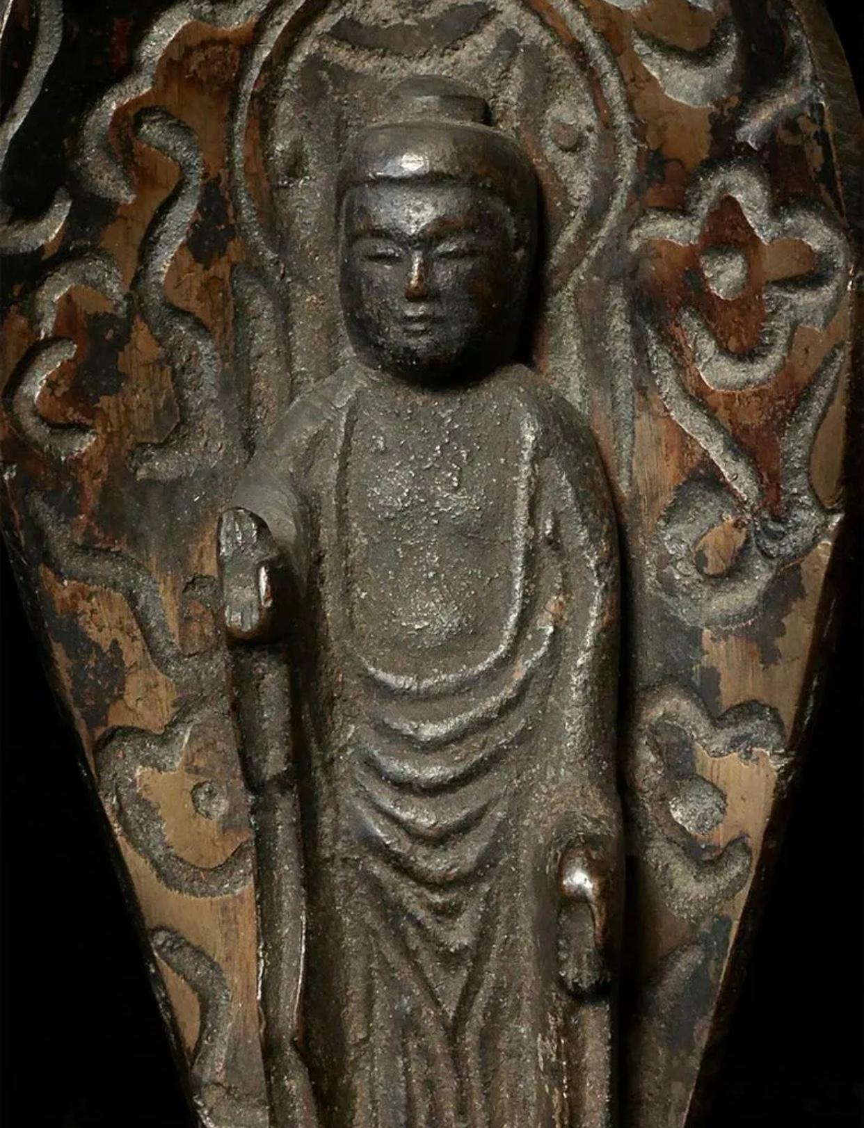 Japanese Momoyama period solid bronze cast diminutive Buddha sculpture. The piece dates from the 16th-17th century, circa 1450-1500, and is in remarkable condition with age-appropriate wear to the patina.