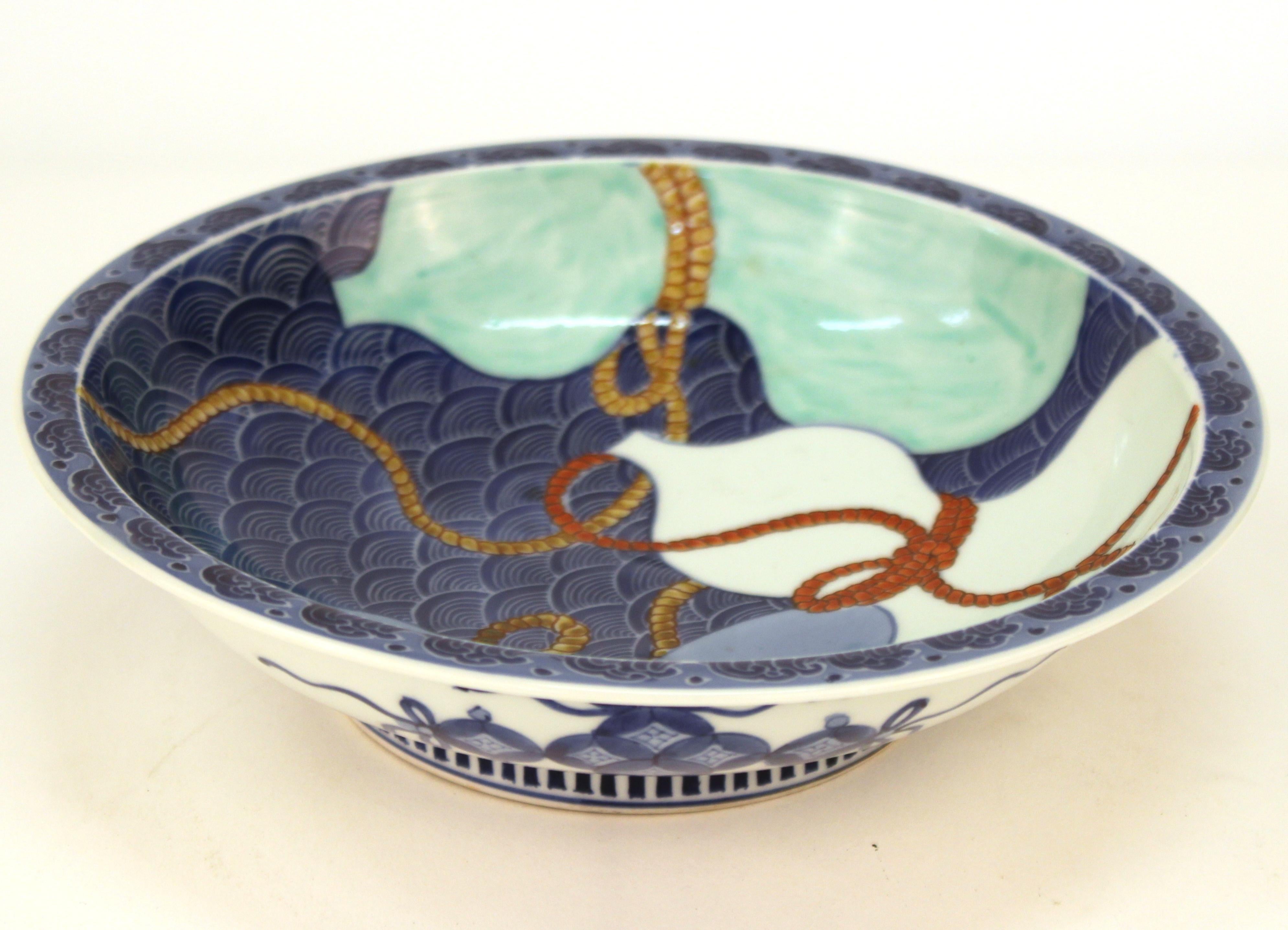 Edo Japanese Nabashima Porcelain Blue Plate with Three Sake Bottle Motif For Sale
