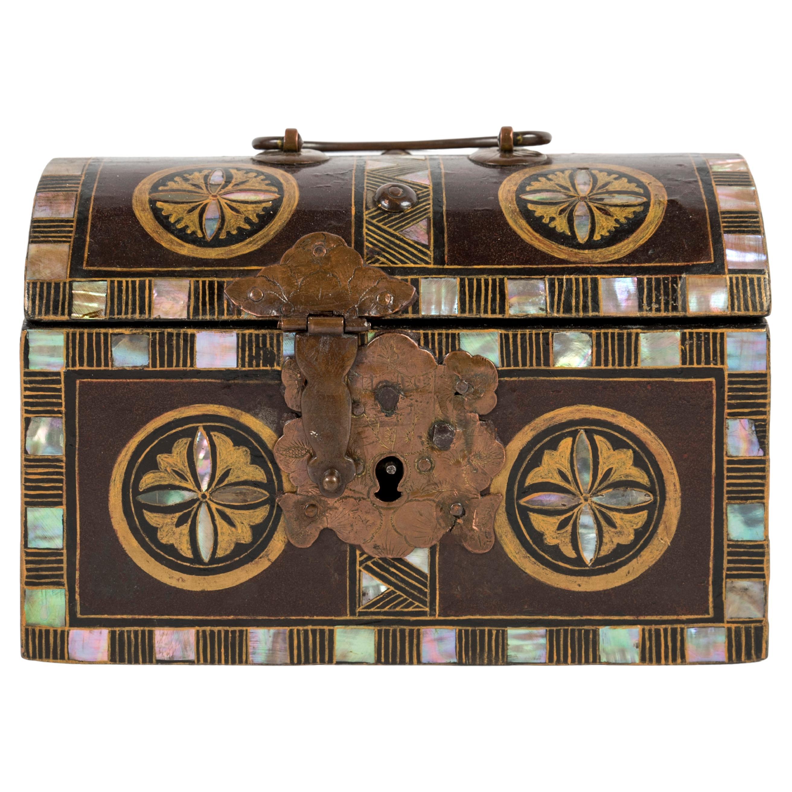 Japanese Namban Chest adorned with cylindrical motives and mother of pearl inlay