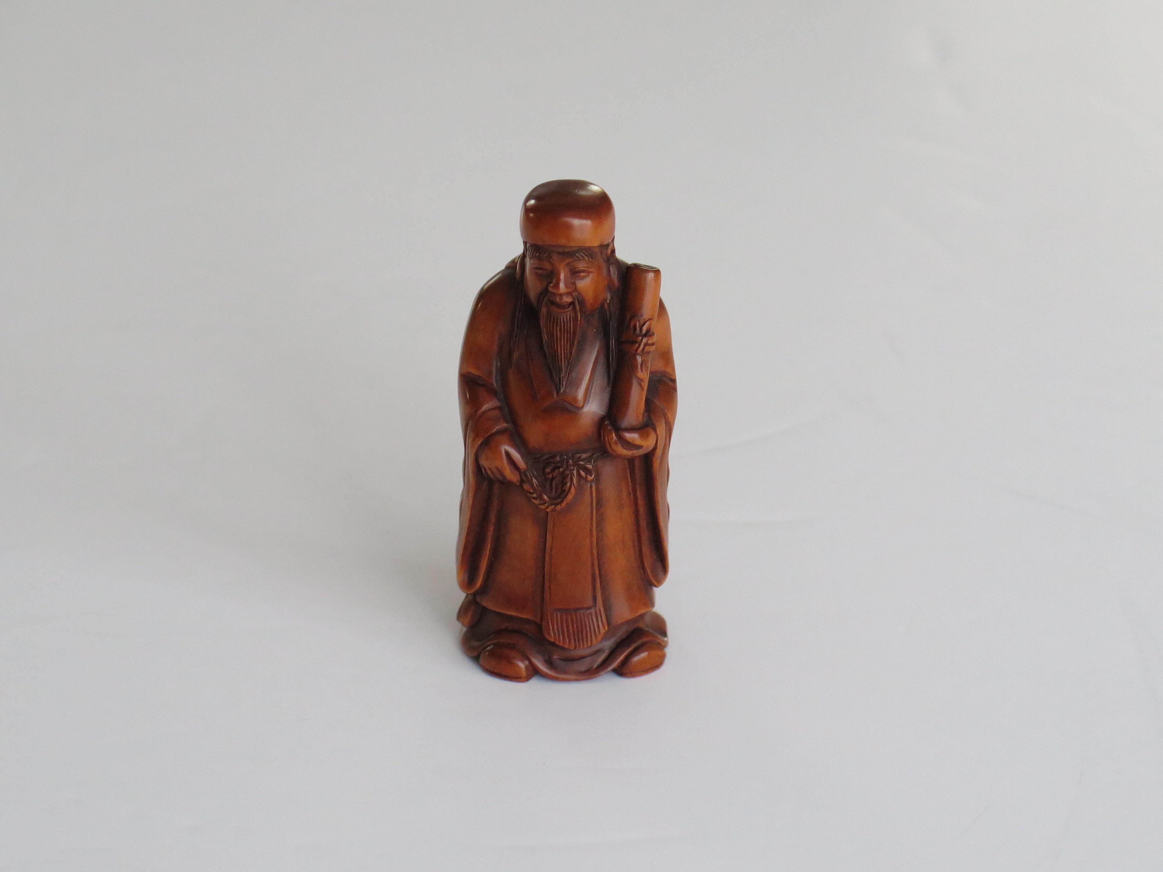 Taisho Japanese Netsuke of Chinese sage with scroll made of boxwood Signed, circa 1920