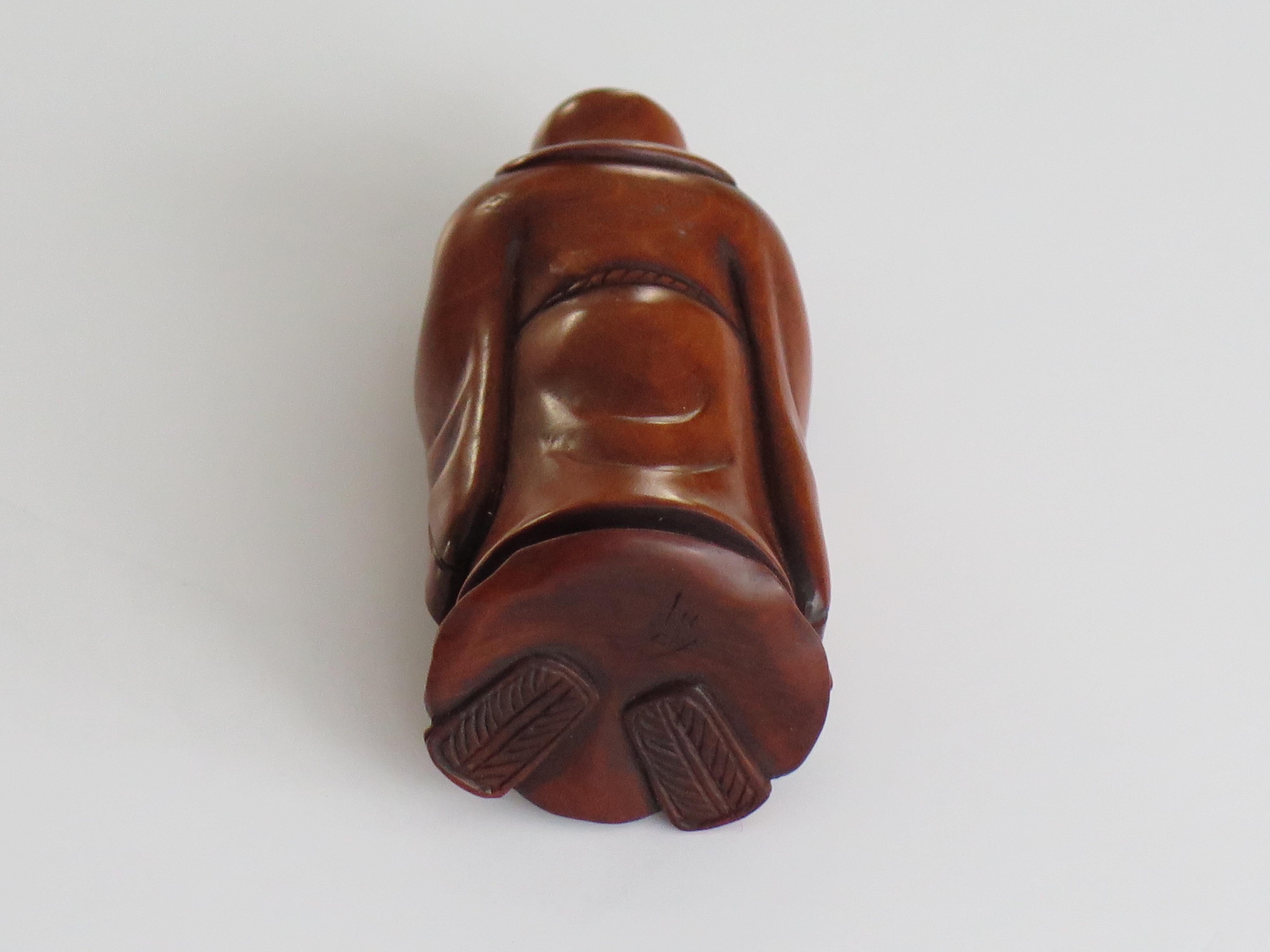 Glazed Japanese Netsuke of Chinese sage with scroll made of boxwood Signed, circa 1920