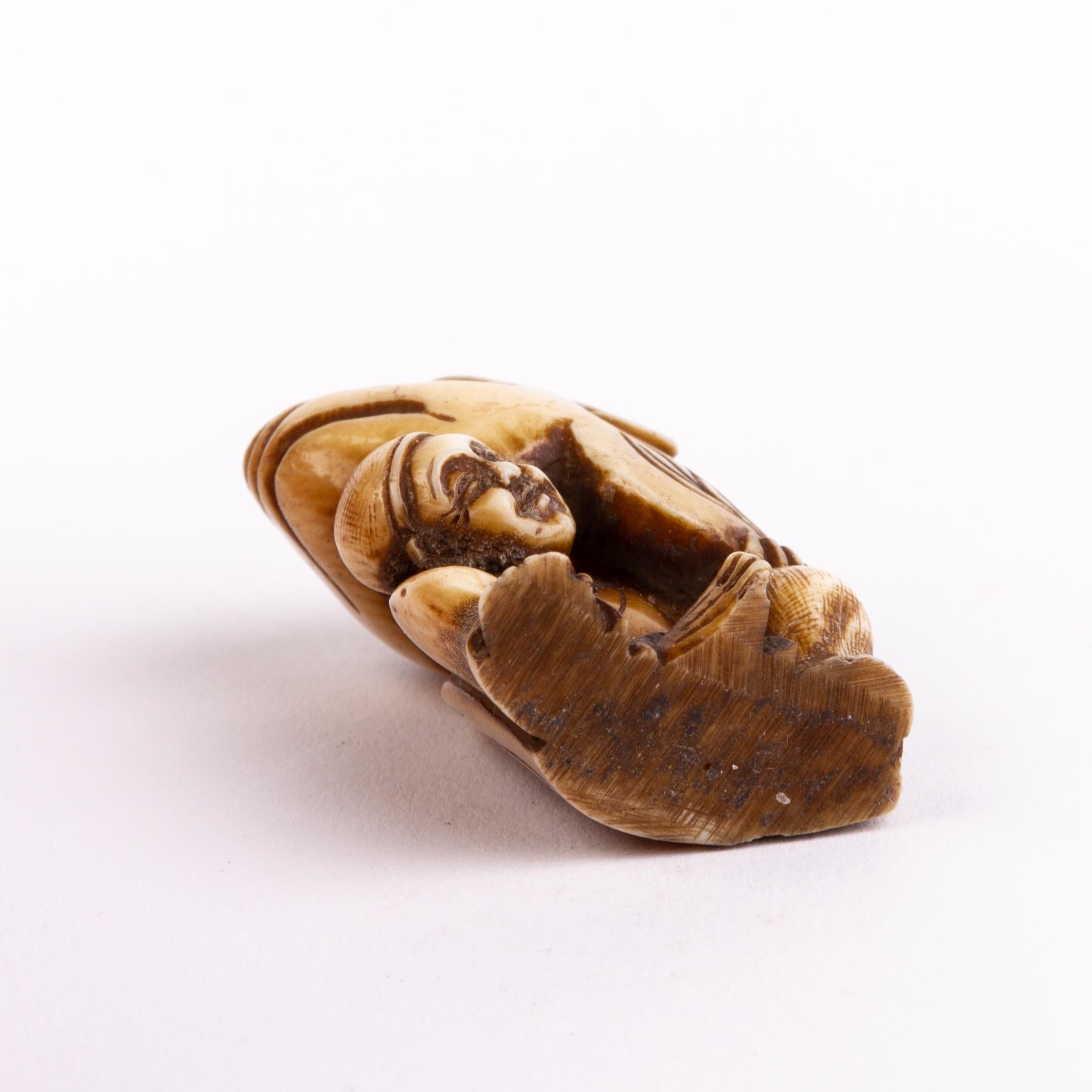 Antler Japanese Netsuke of Man Disguised as a Tiger For Sale