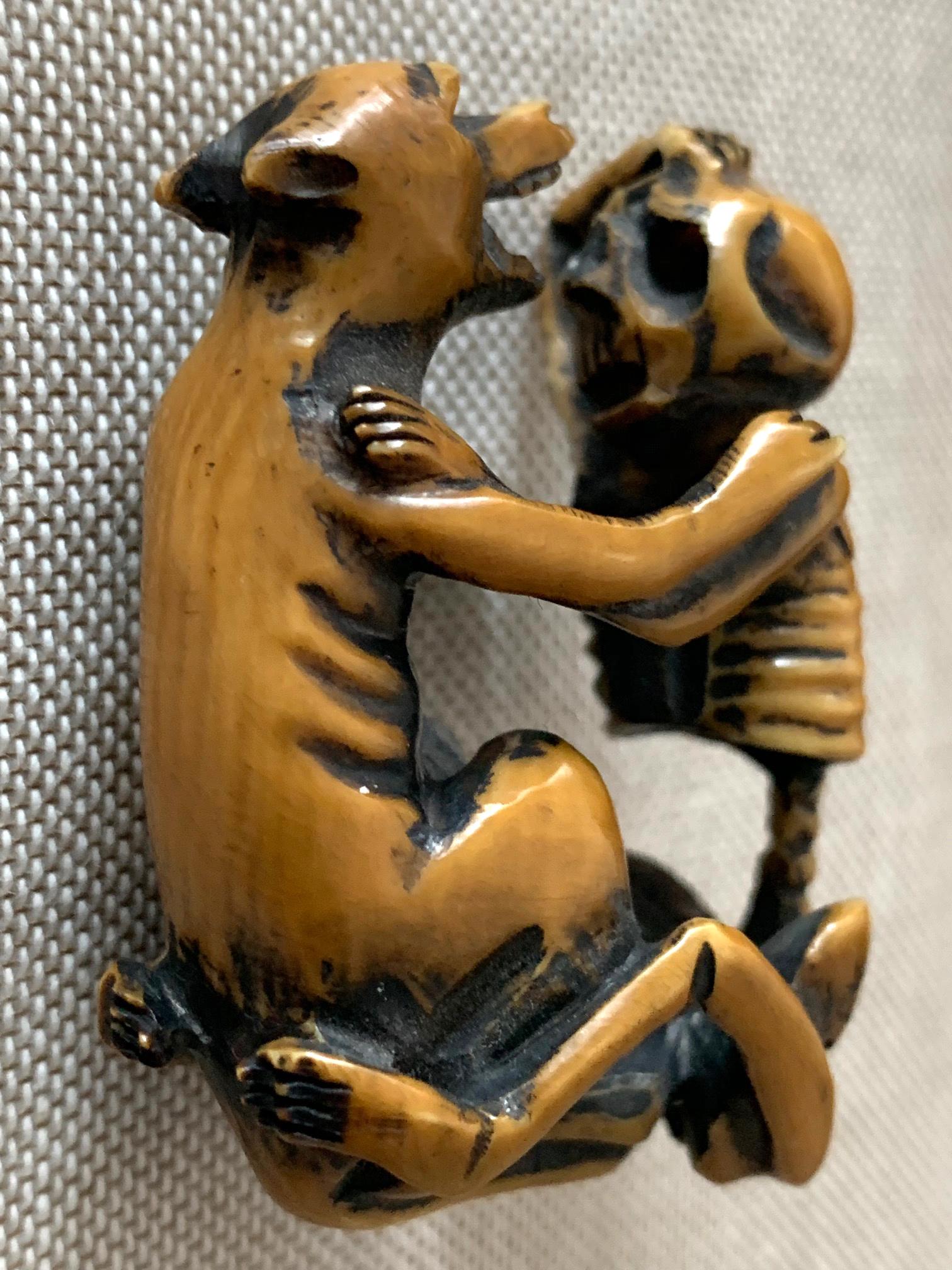 Hand-Carved Japanese Netsuke Skeleton and Wolf Meiji Period