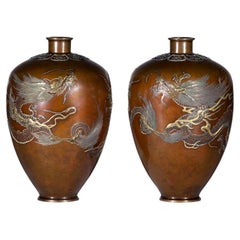 Japanese Nogawa company pair of patinated bronze