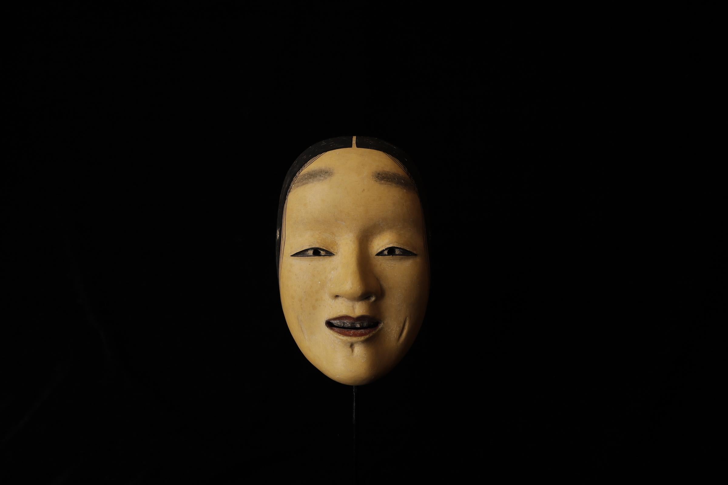 Ko-omote

The Ko-omote mask is most often used in Noh performances to depict young women of noble birth or spirits of young maidens. Characters portrayed with this mask are usually gentle, refined, and often in roles that involve romantic love,