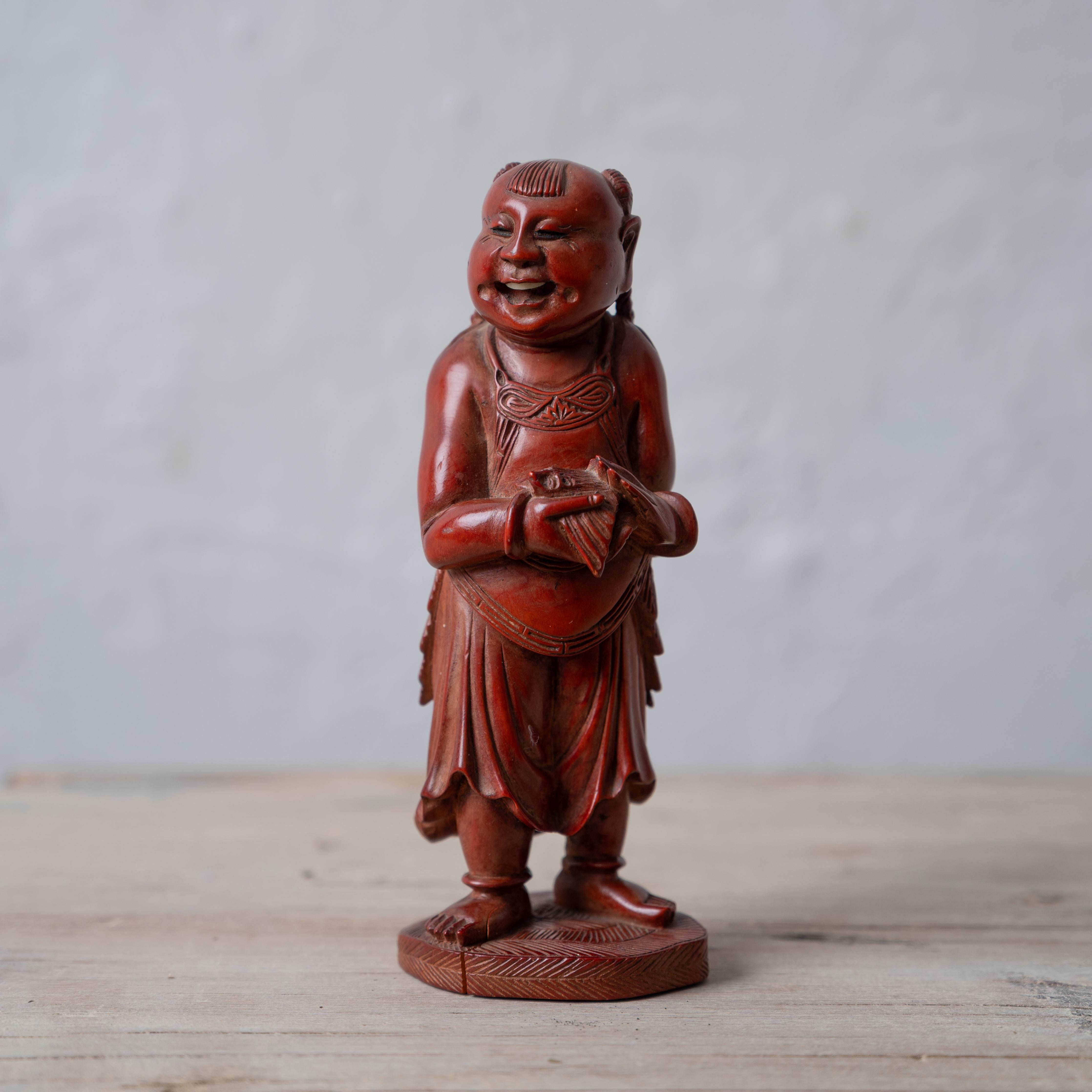 A Japanese okimono carving of a man petting a bat, early 20th century.

2 ¼ inches wide by 1 ¾ inches deep by 6 inches tall



