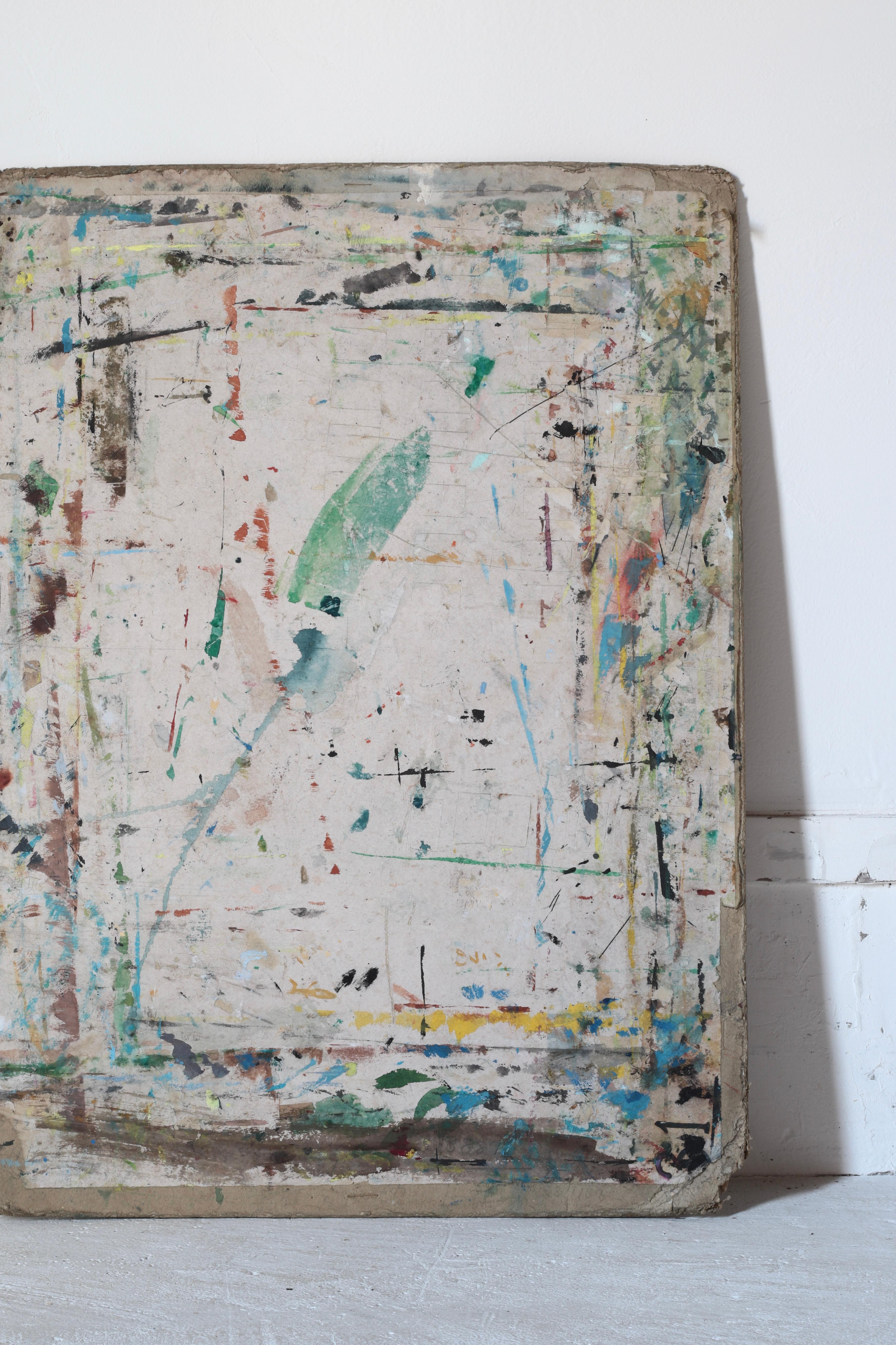 This is a drawing board used by a Japanese painter.

It is made by gluing together pieces of cardboard, and it is thought that the artist repeatedly painted on it.
The colorful water-based paints, lines, and cutter marks are all mixed together, and