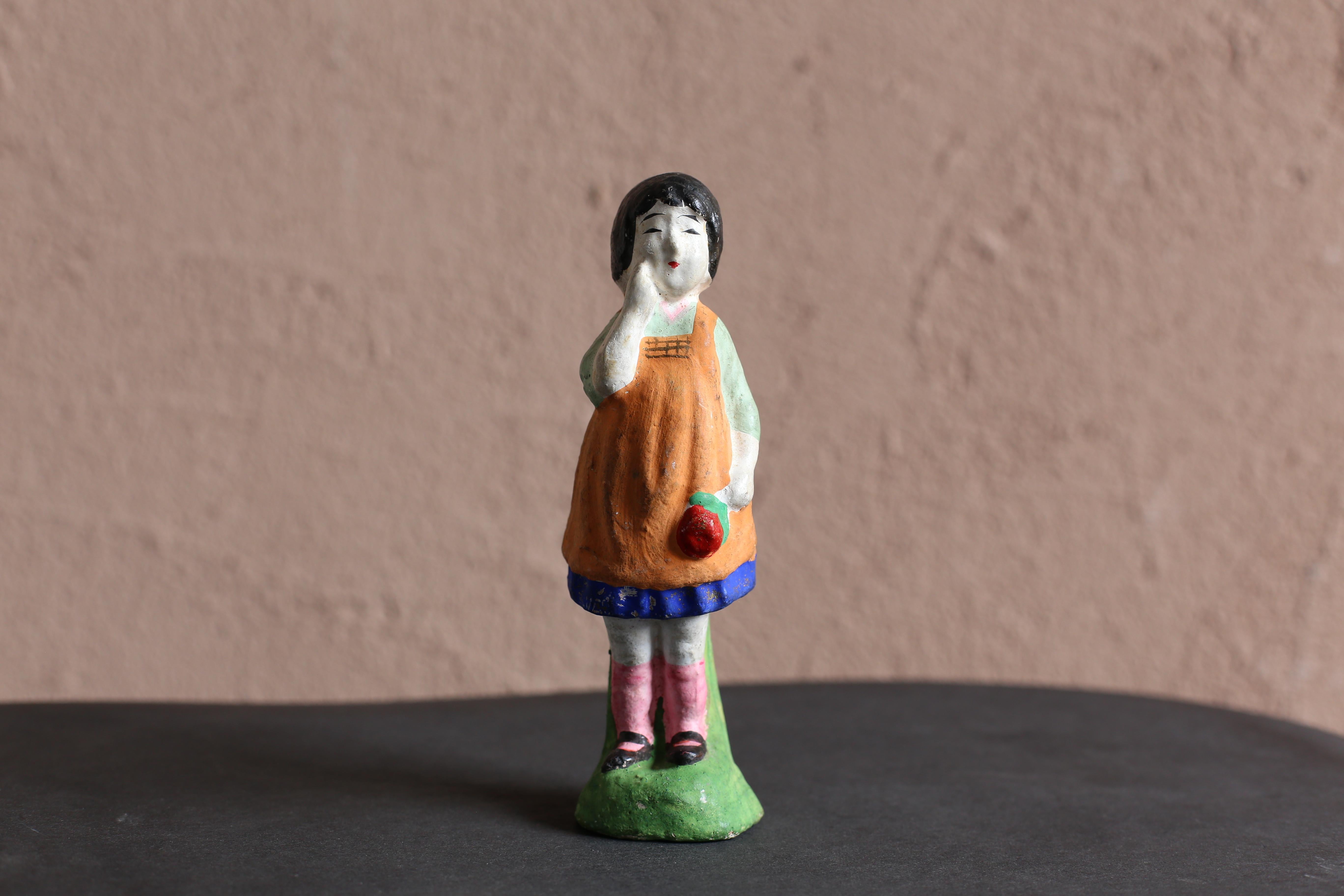 An old Japanese clay doll.
This is probably a 