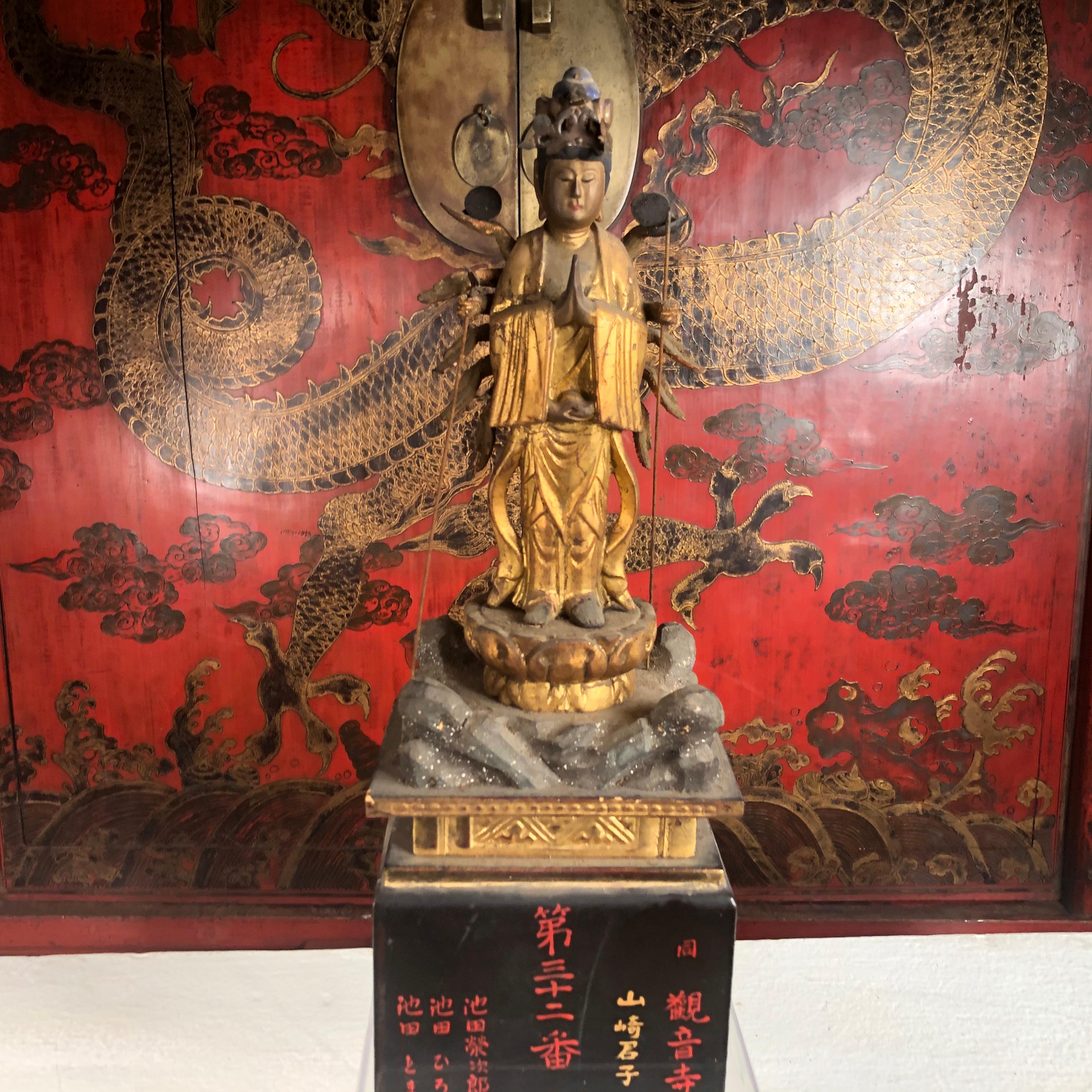 Buddhist Gold Gilt Mankind's Protector, Signed

This is a scarce and lovely Japanese temple find, a gold gilt and lacquered wooden many armed Kanon, Guan yin and Bodhisattva standing tall and with multiple arms and hands in assisting sentient