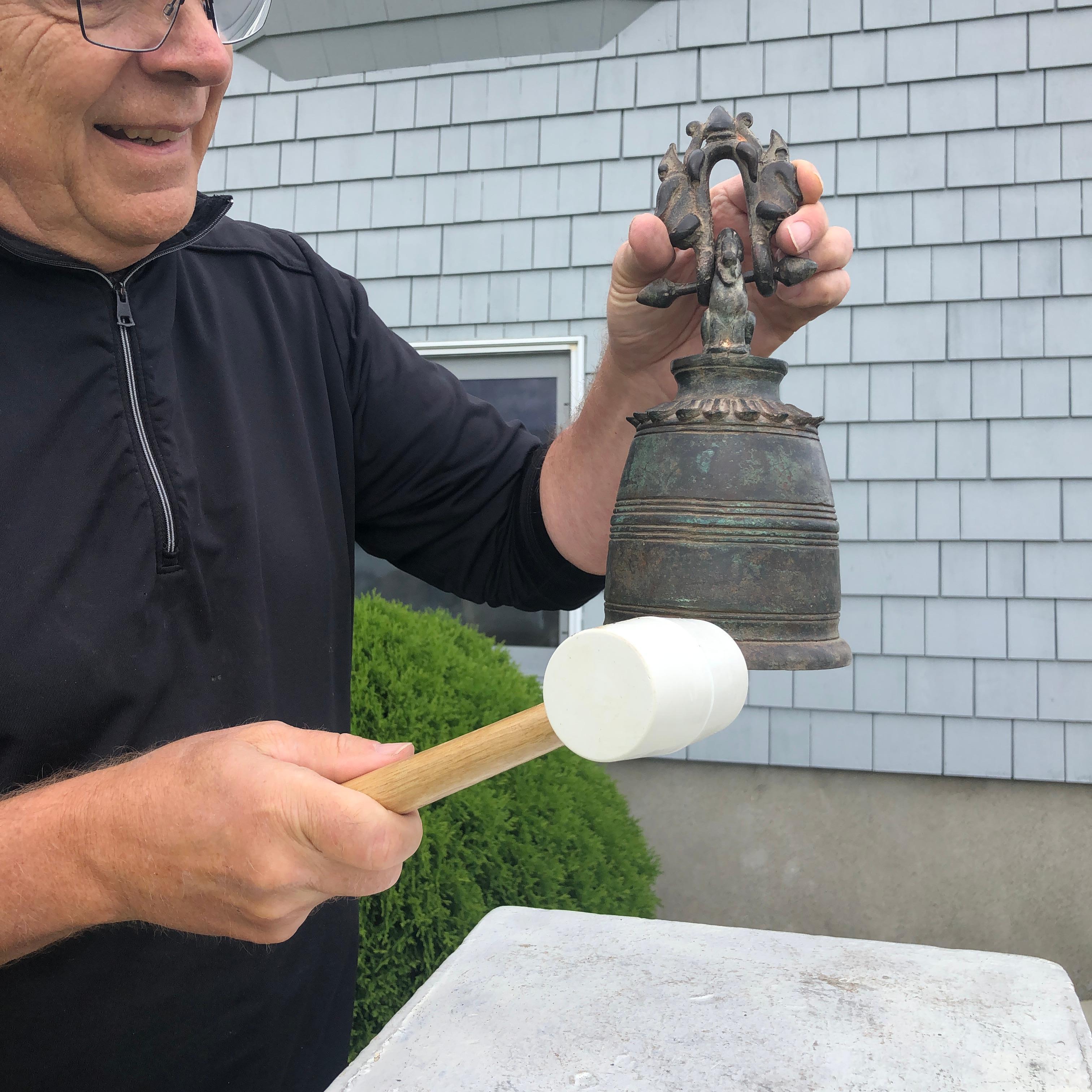 From Japan an unusual find- and excellent candidate to accent your indoor or outdoor garden space. 

The first we have seen.

This is an antique bronze casting of a wonderful medium scale temple bell complete with an unusual 