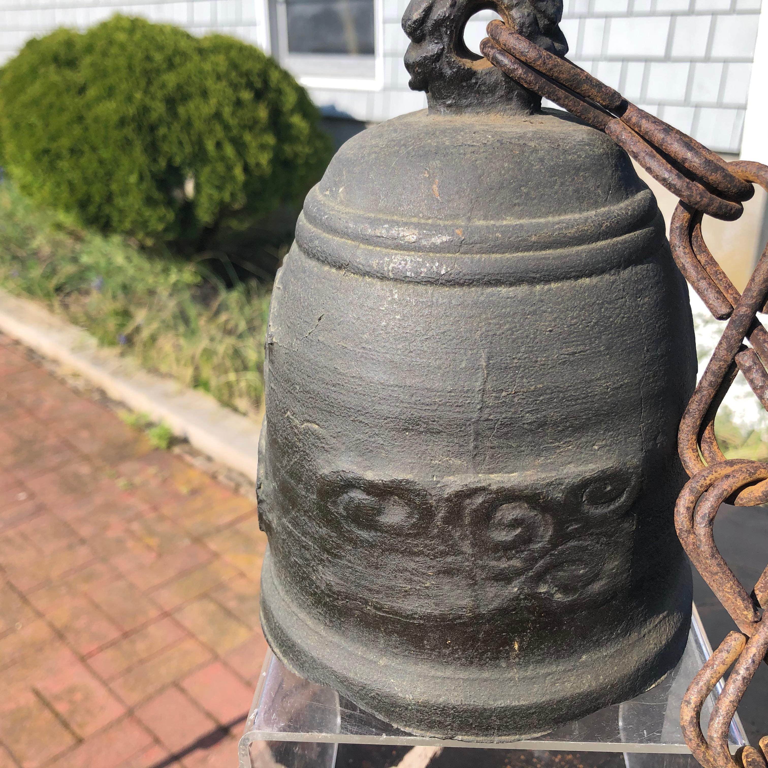 From Japan an unusual find- and excellent candidate to accent your indoor or outdoor garden space. 

This is an antique bronze casting of a wonderful medium scale temple bell complete with an unusual 