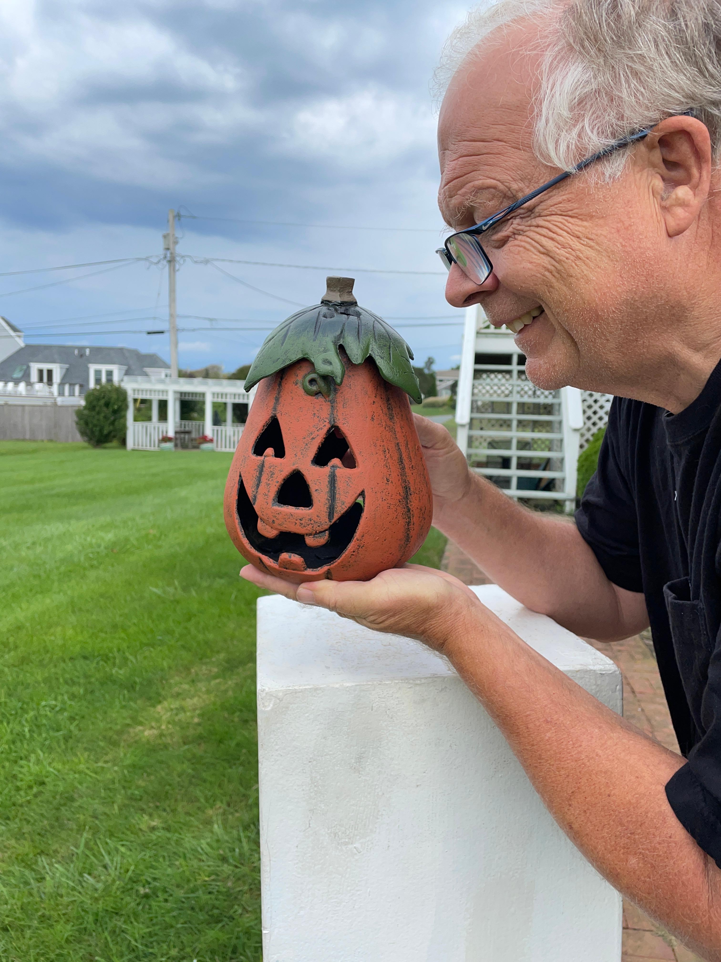 From our recent acquisitions- an old vintage gourd shaped example #4

Japan, this handsome quality iron Halloween Jack-O-Lantern with its two charming faces still retains its original orange, green, and black, paint plus includes its convenient