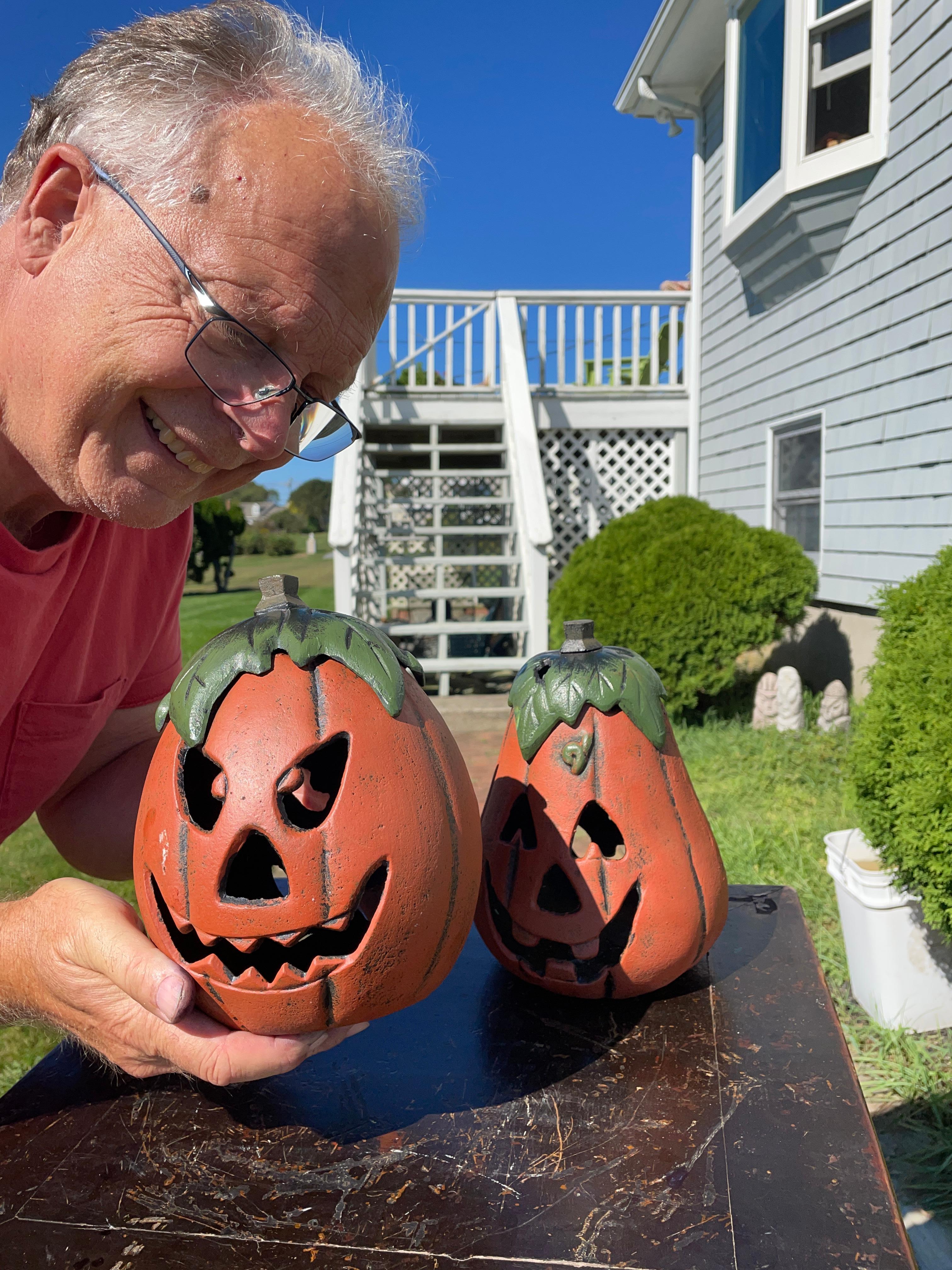 From our recent garden acquisitions- a happy pair with original box 

Japan, this handsome pair (2) of quality vintage iron halloween happy Jack-O-Lanterns with their friendly bi-faced designs and separate greenery toppers, (two charming faces on