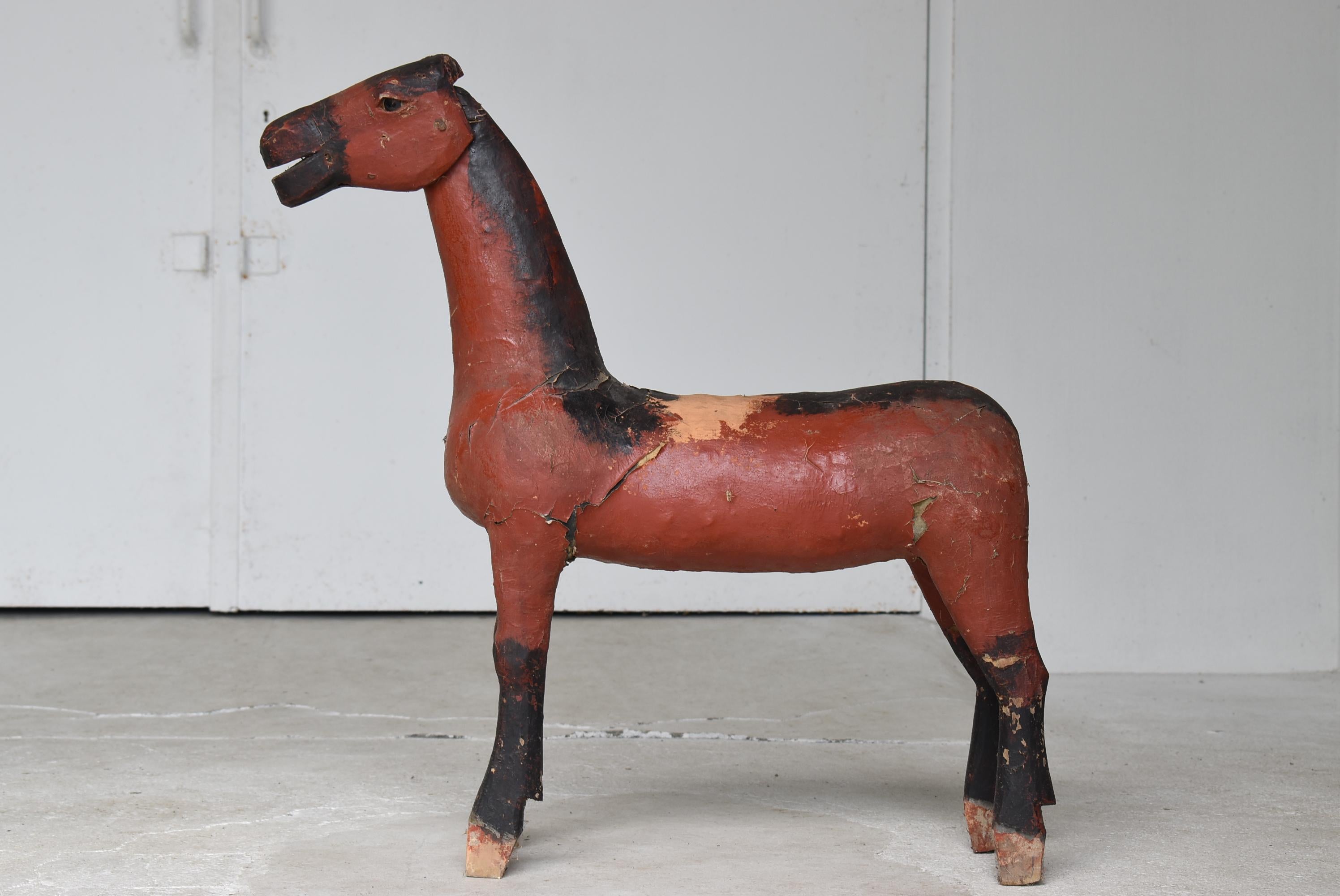 It is an old Japanese wood carving horse.

It is from the Edo period.
It is painted with lacquer.

In Japan, there has been a culture of dedicating horses to shrines for a long time.
In modern times, the culture has faded and no such wood