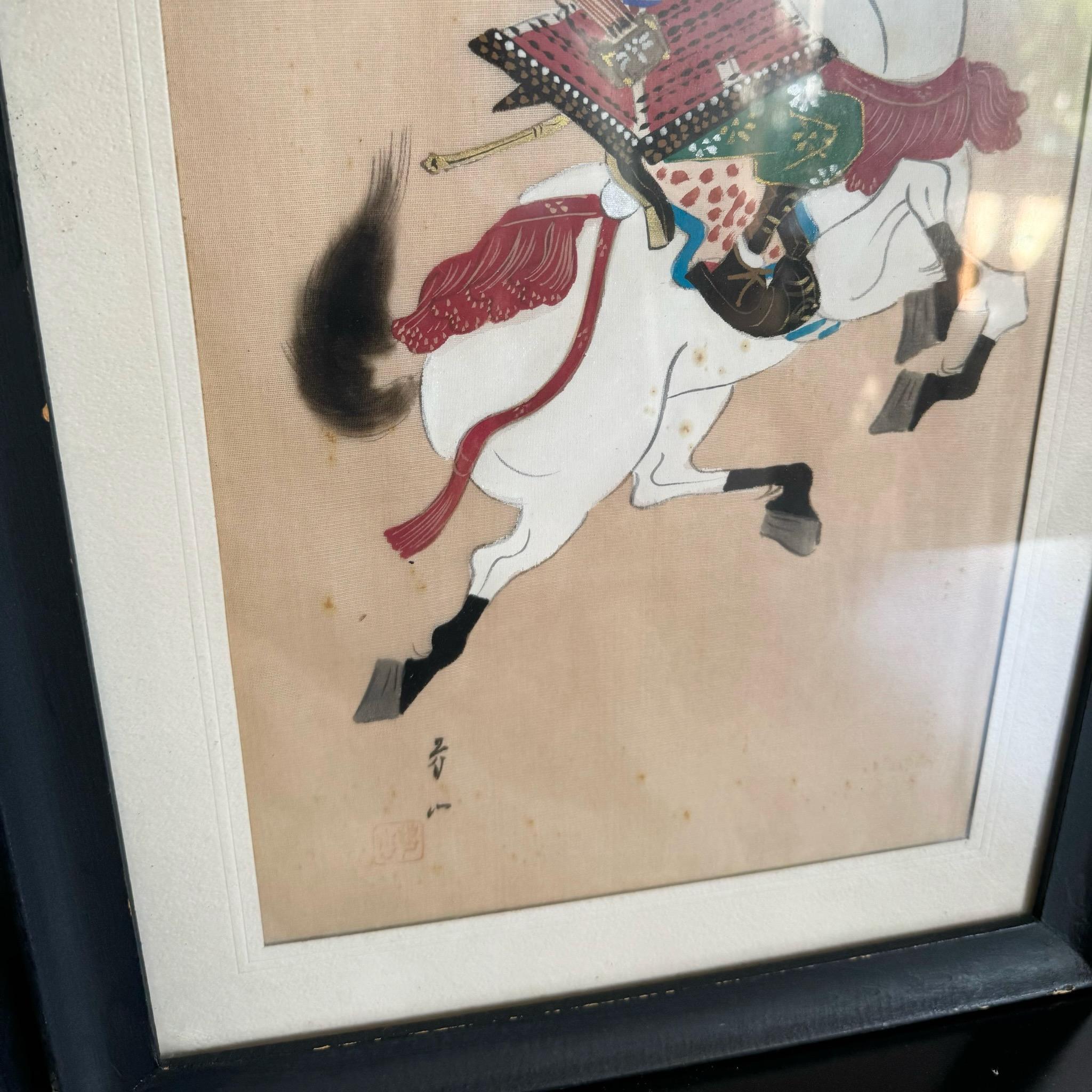Elevate your decor with this pair of Japanese silk paintings depicting Samurais on horseback. These beautifully detailed artworks capture the dynamic energy and historical significance of samurai warriors, making them a perfect addition to any room