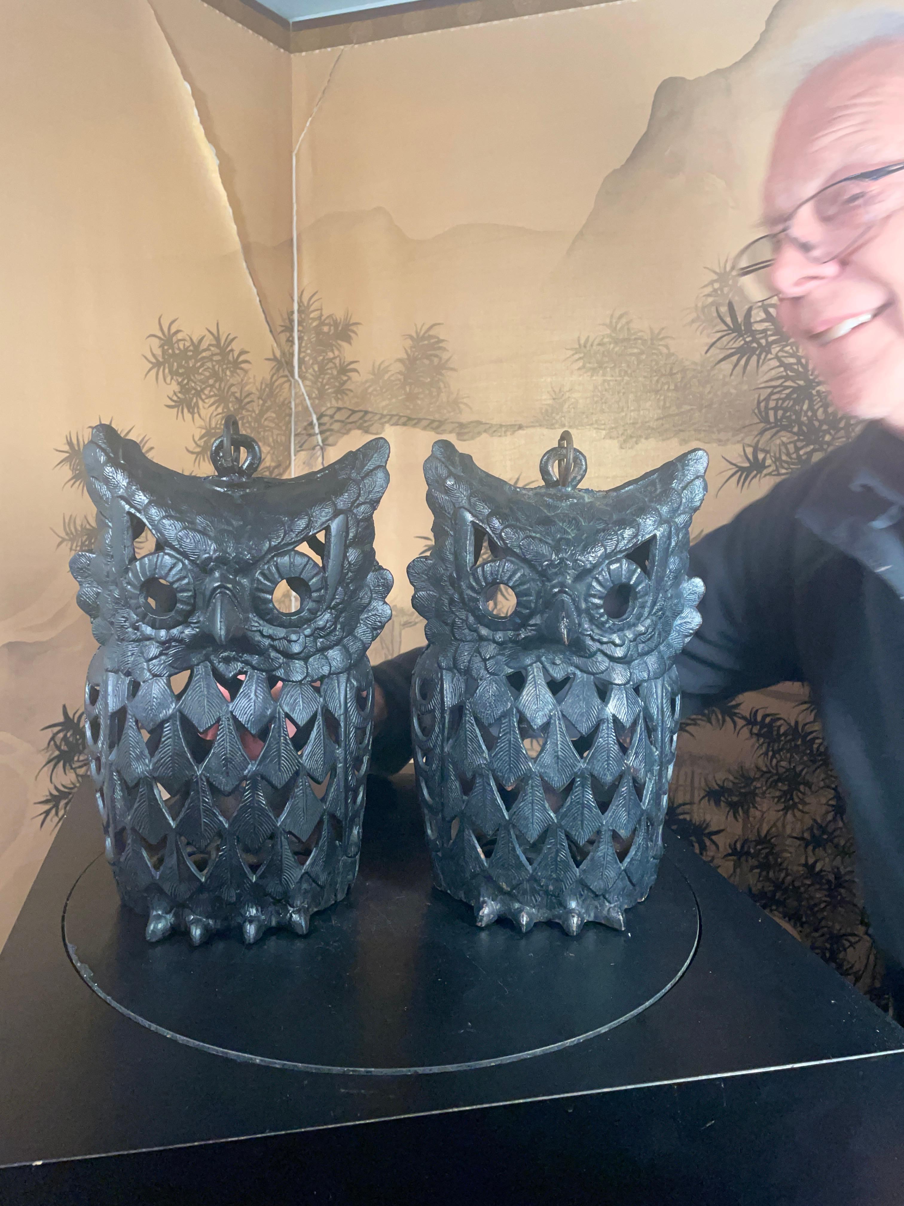 Extraordinary pair in an extraordinary size- lovely dark patina.

Japanese pair (2) massive over size antique owl lighting lanterns, 13 inches tall

This handsome pair Japanese quality over sized iron 