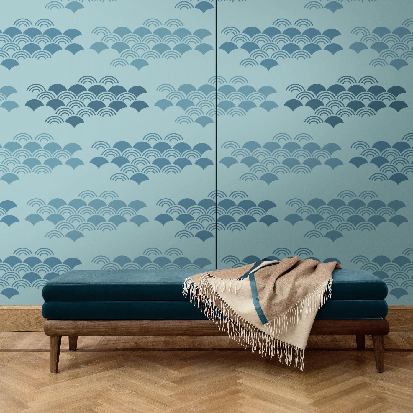 A delicate and modern interpretation of Japanese decorative patterns, this wall covering is a sophisticated addition to a contemporary interior. It was crafted of silk and cotton and boasts a tonal color palette of turquoise and green. It comes in