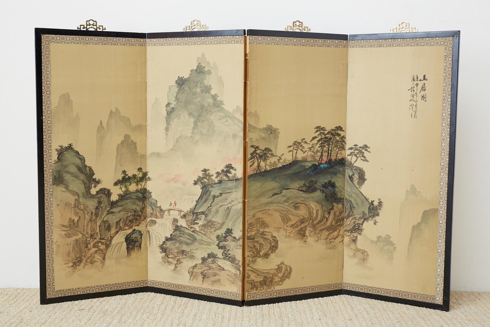 Dramatic Japanese late Meiji early Showa period landscape screen titled Mountain Residence. Ink and color pigments on paper made in the Nihonga school style. Signed Sankyo and dated with cyclical date April 1920. Set in a black lacquered frame that