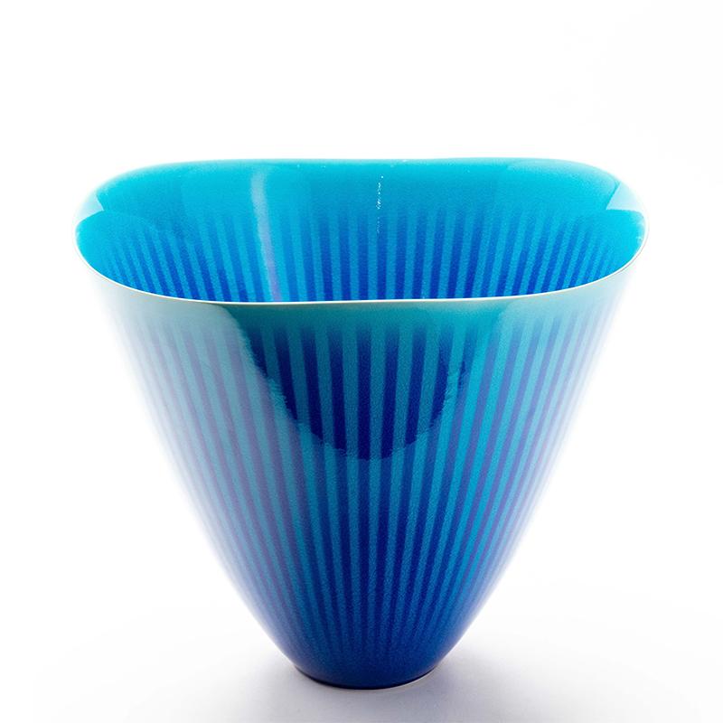 Exceptionally fine Japanese porcelain blue and turquoise striped Studio Vase by Atsushi Miyanishi. 

This stunning contemporary bowl is a statement piece all on it's own. With sky blue stripes under a cobalt blue enamel over-glaze and a gently