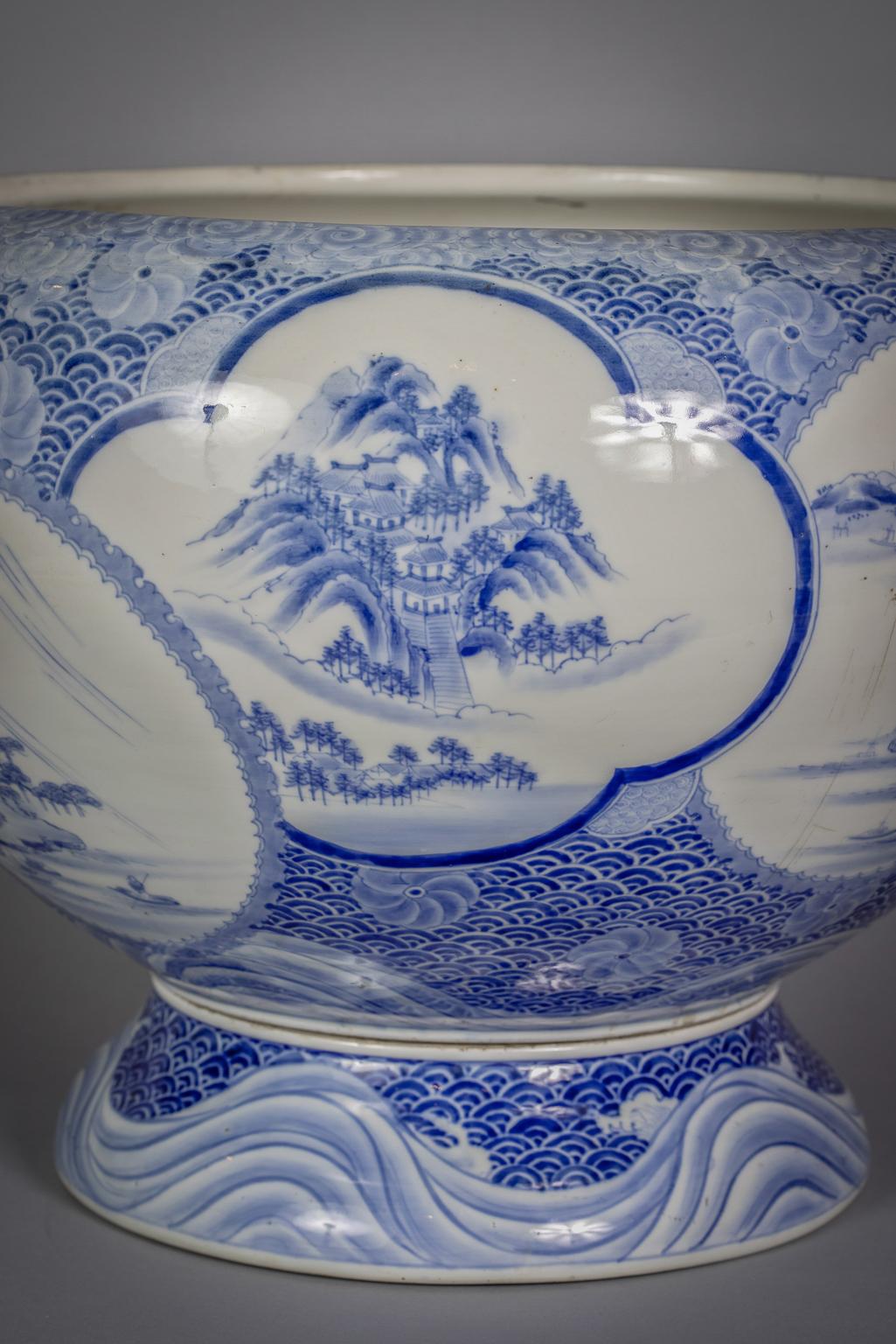 Late 19th Century Japanese Porcelain Blue and White Fish Jardiniere on Stand, circa 1890 For Sale