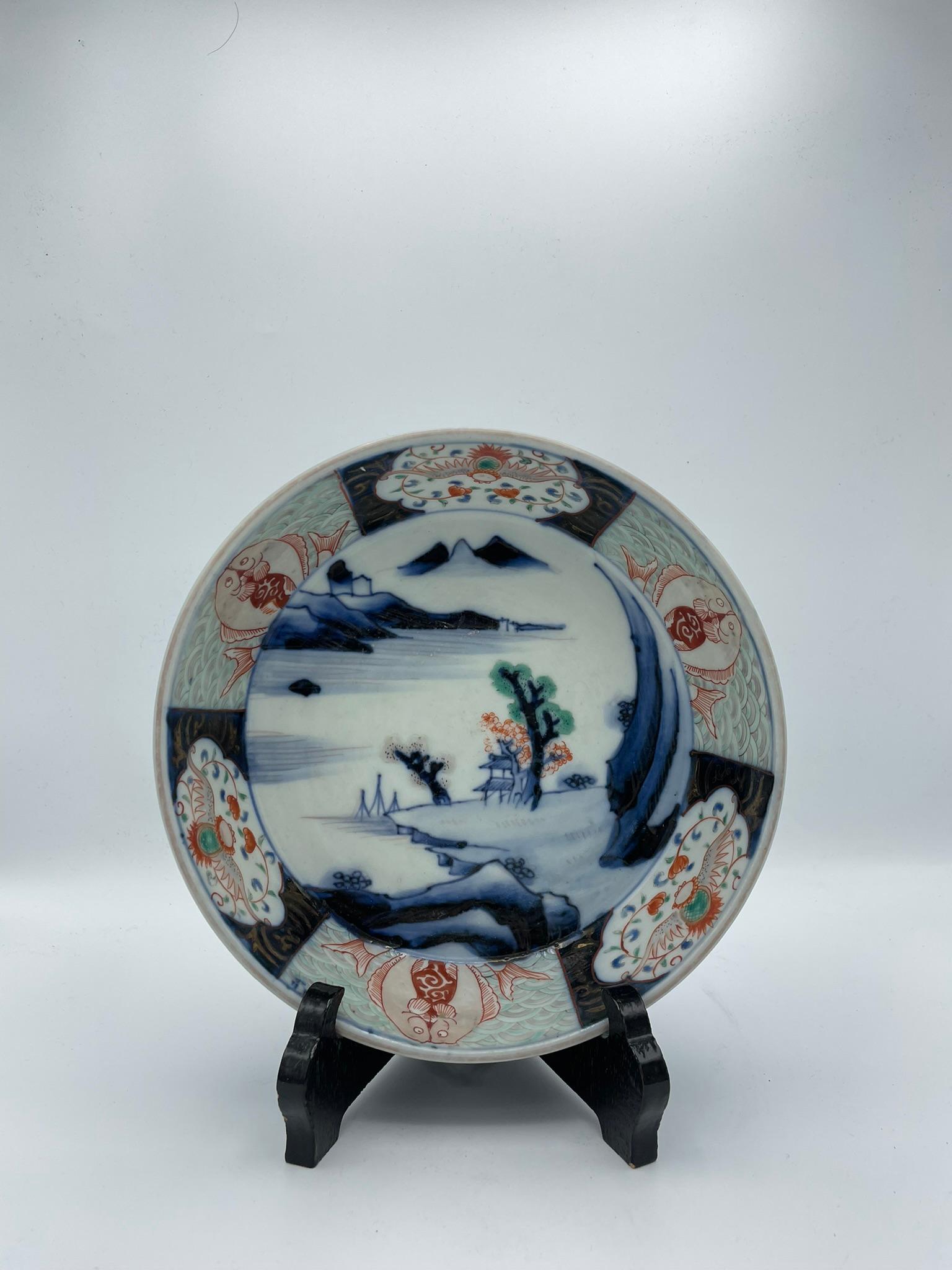 This is a serving bowl made around 1868- 1912s (in Meiji era). It is made with style Imari-yaki (Imari ware). 
You can use as a serving bowl but also as a decoration.

Dimensions:
21.2cm × 21.2cm × H 7.3 cm


Imari-yaki (Imari ware) was