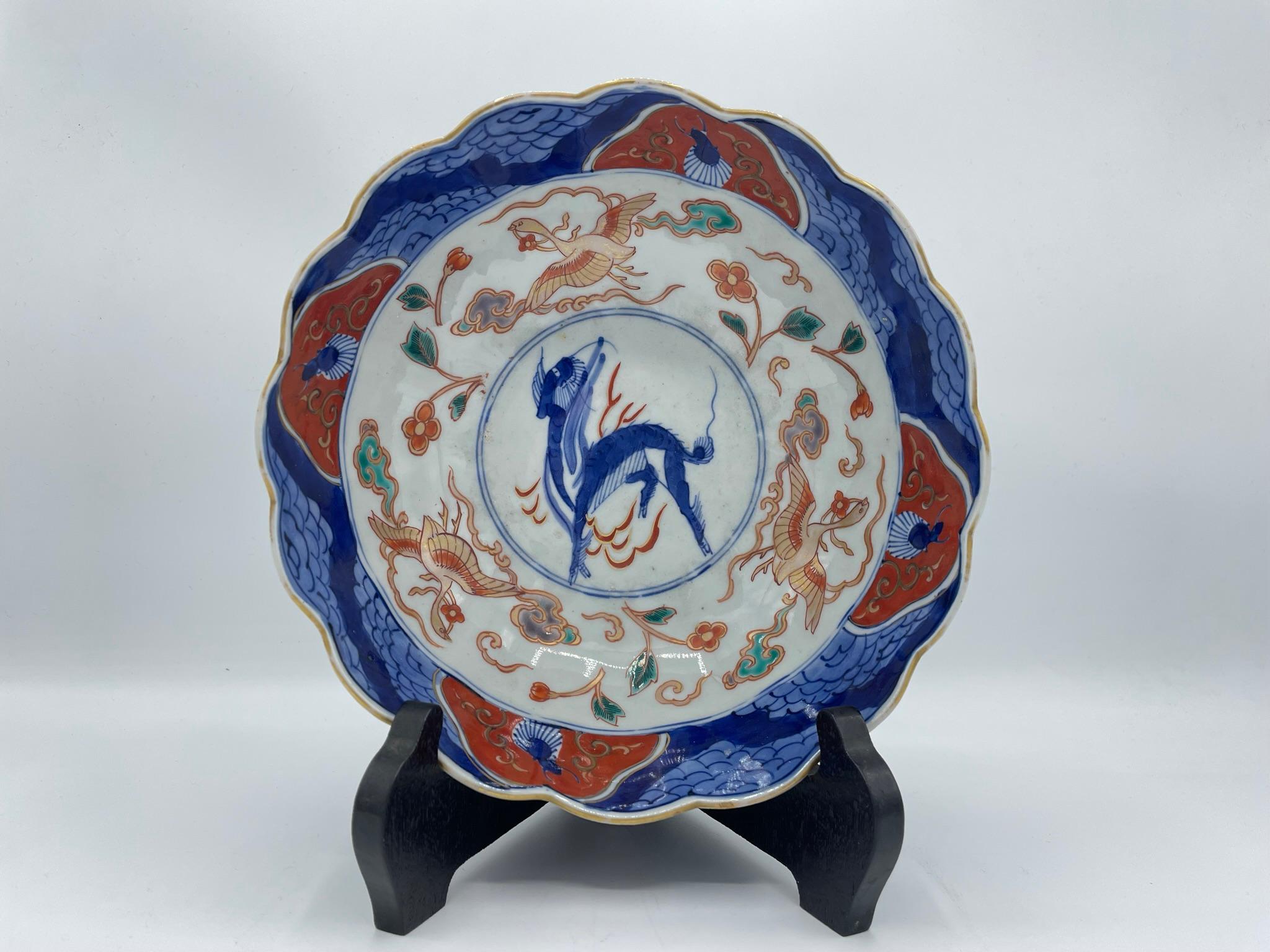 This is a serving bowl made around 1900s (in Meiji era). It is made with style Imari-yaki (Imari ware). 
You can use as a serving bowl but also as a decoration.

Dimensions:
18.5cm × 18.5cm × H 8 cm


Imari-yaki (Imari ware) was started to