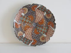 Japanese Porcelain Dish or Plate hand painted wheels, Meiji Period circa 1870
