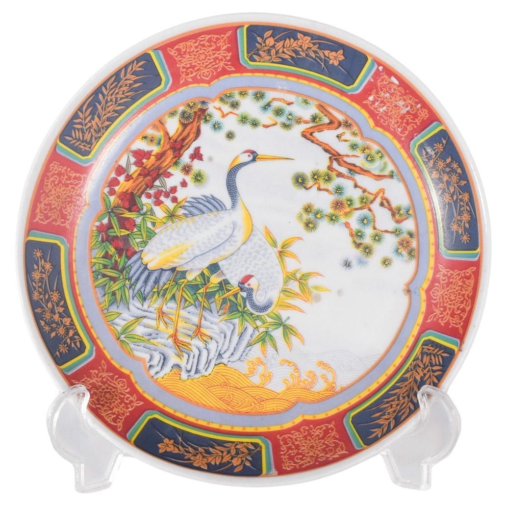 Assiette en porcelaine japonaise décorée polychrome
