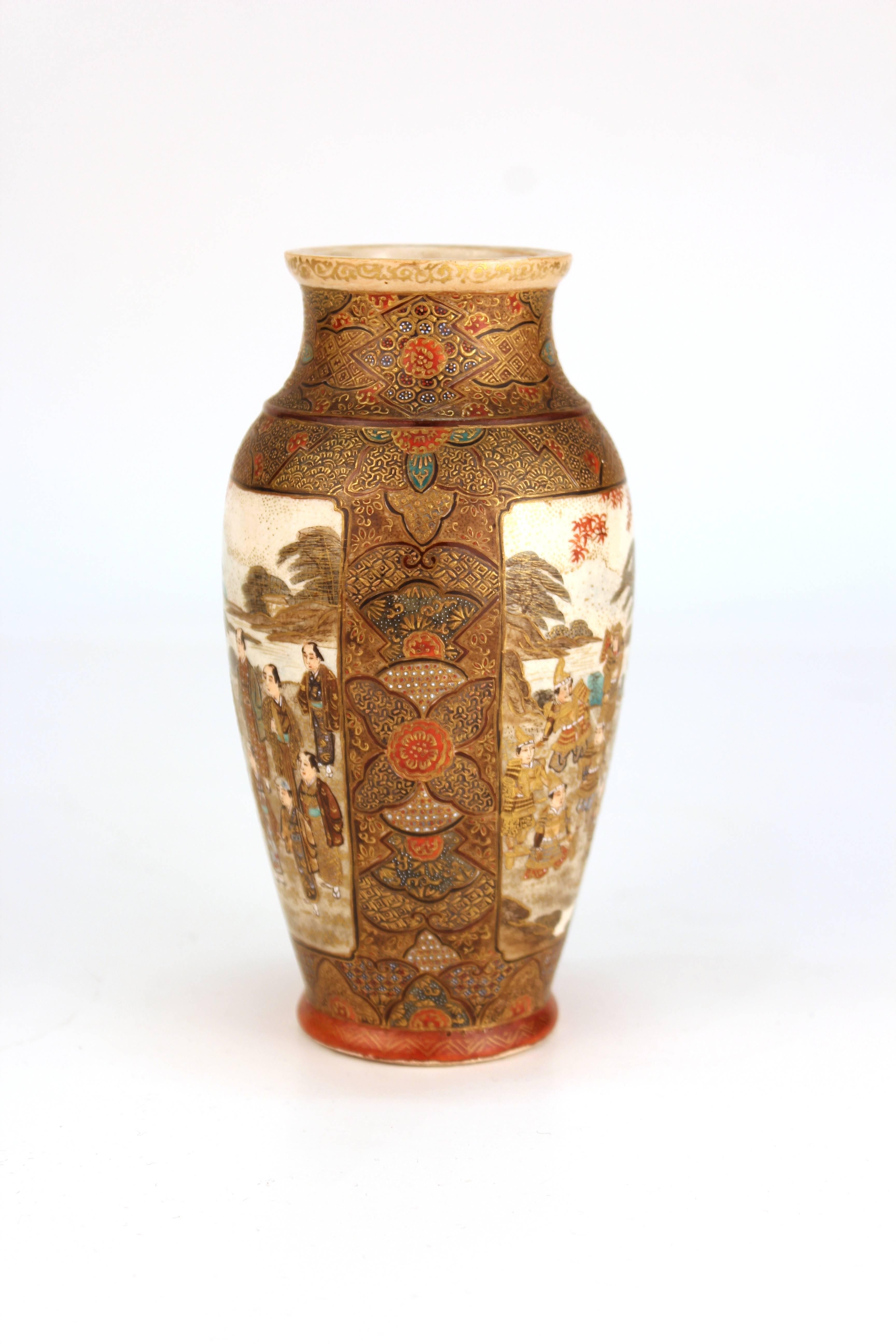 A Japanese Satsuma porcelain vase in baluster shape, depicting samurais and noblemen. The piece is in good vintage condition and has one fleabite chip to the rim.