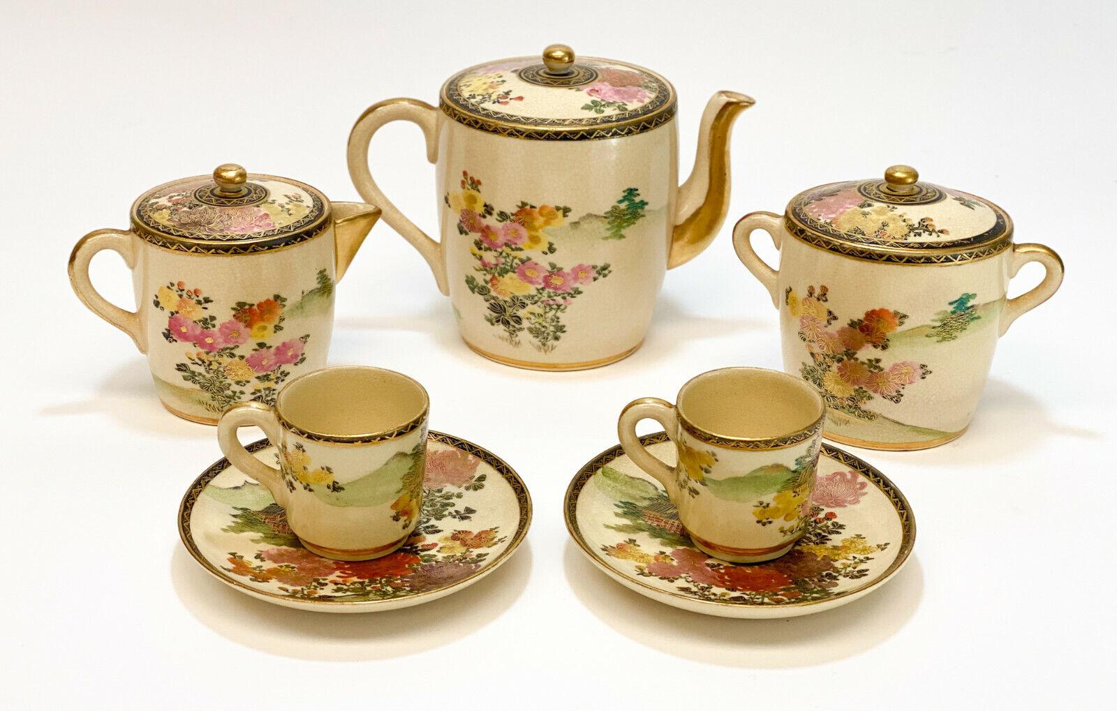 Japanese Porcelain Satsuma Hand painted tea service for 2, Early 20th Cent.

Beautiful hand painted floral and landscape scenes throughout with gilt accents. Japanese mark to the underside.

Additional Information:
Dimension: Teapot: 6.5 inches