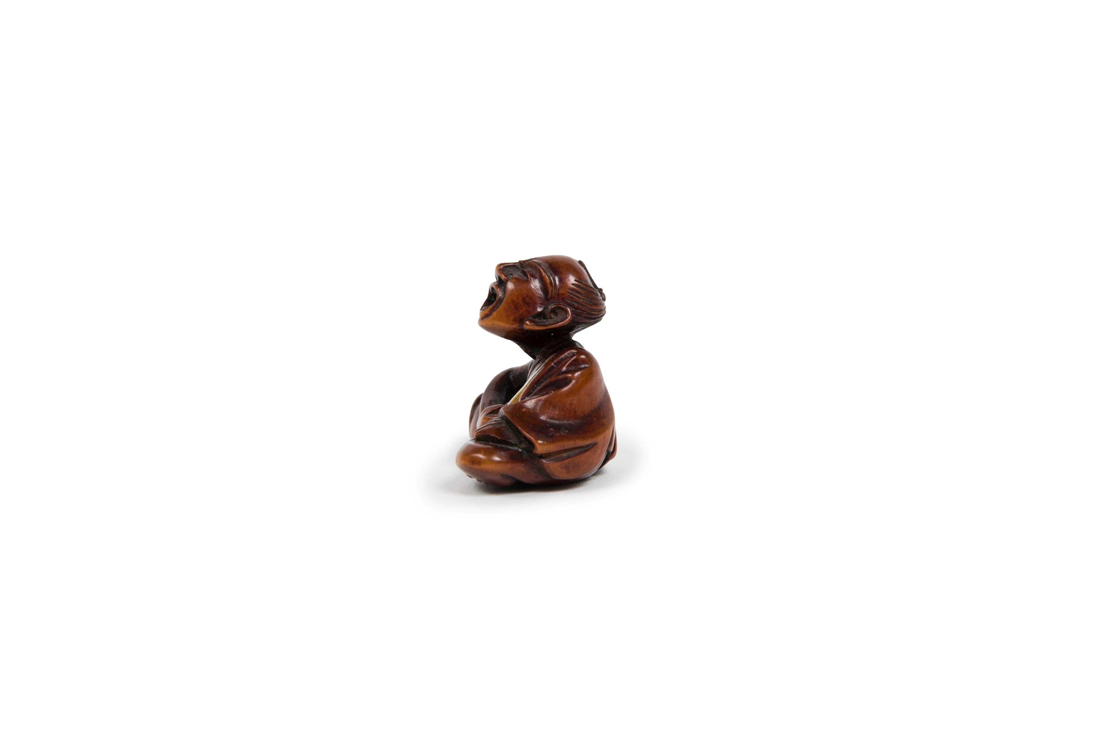 Carved Japanese Professional sneezer Boxwood Netsuke For Sale