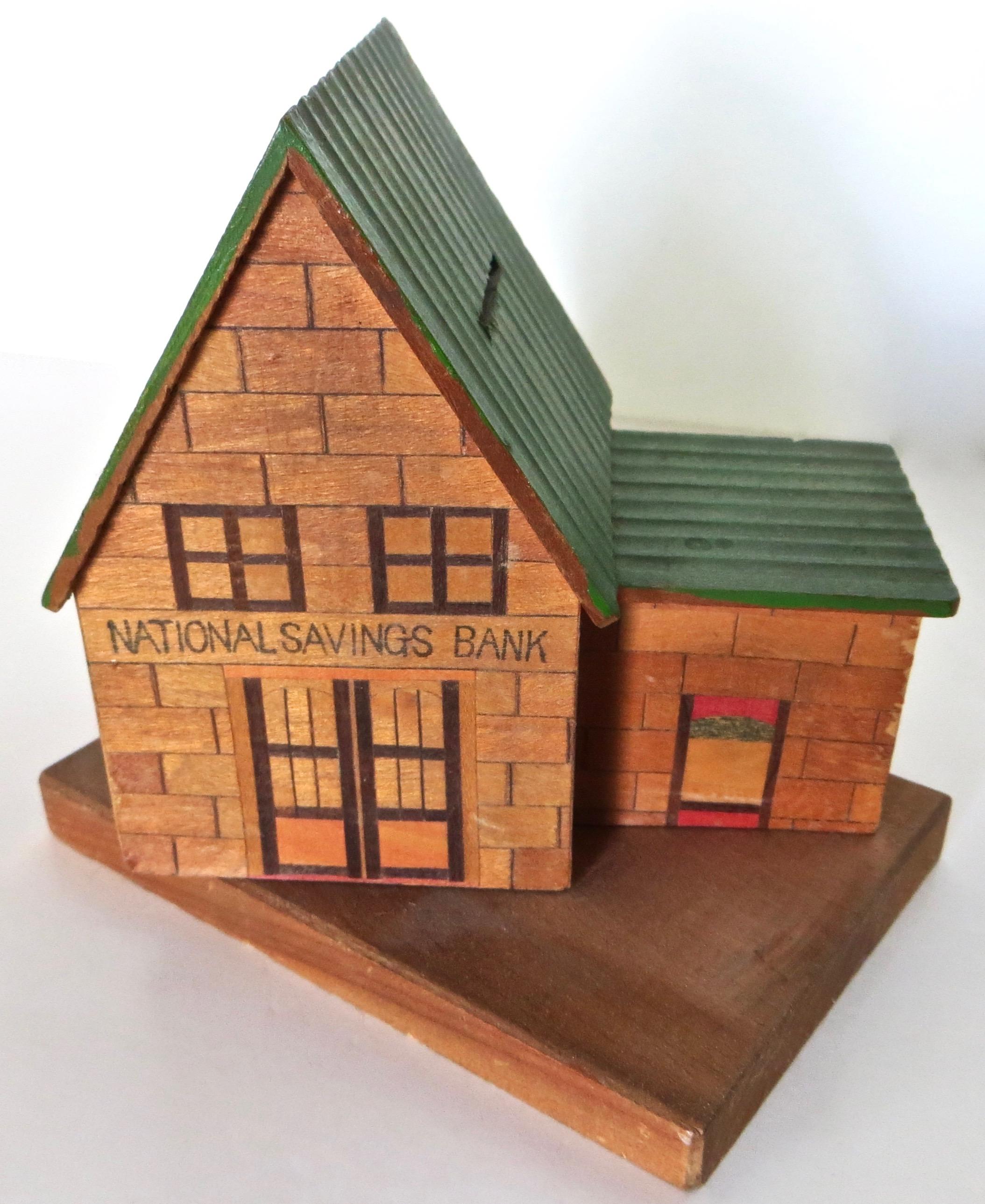Hand-Crafted Japanese Puzzle Bank Portrays A Building Bank 