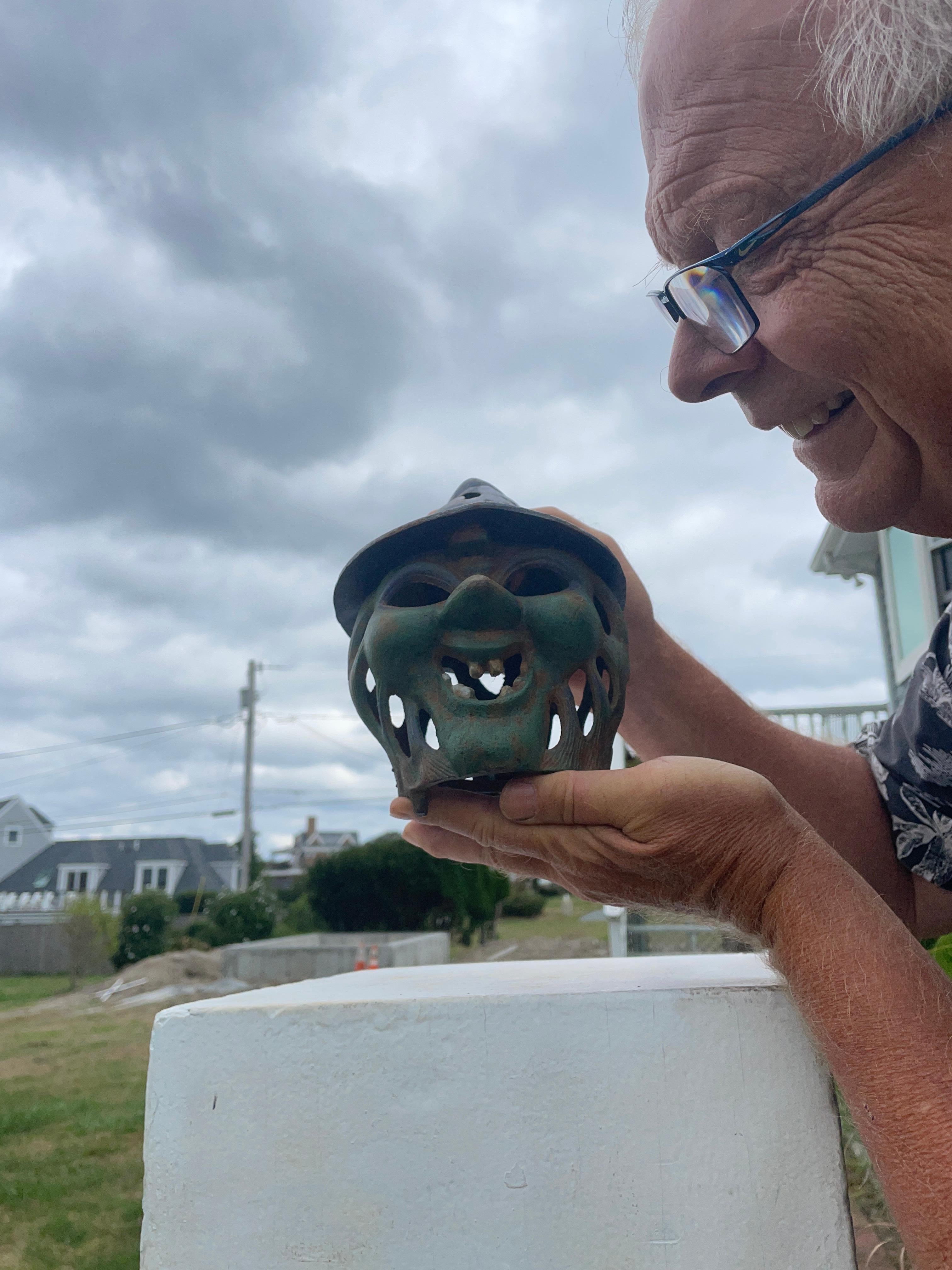 Rare one-of-a-kind, spooky, and desireable - immediate shipment for celebration and display.

What a smiling toothy grin and with her pointed old perforated hat.

Japan, this rare one-of-a-kind witch's hat lighting latnern is the first we have