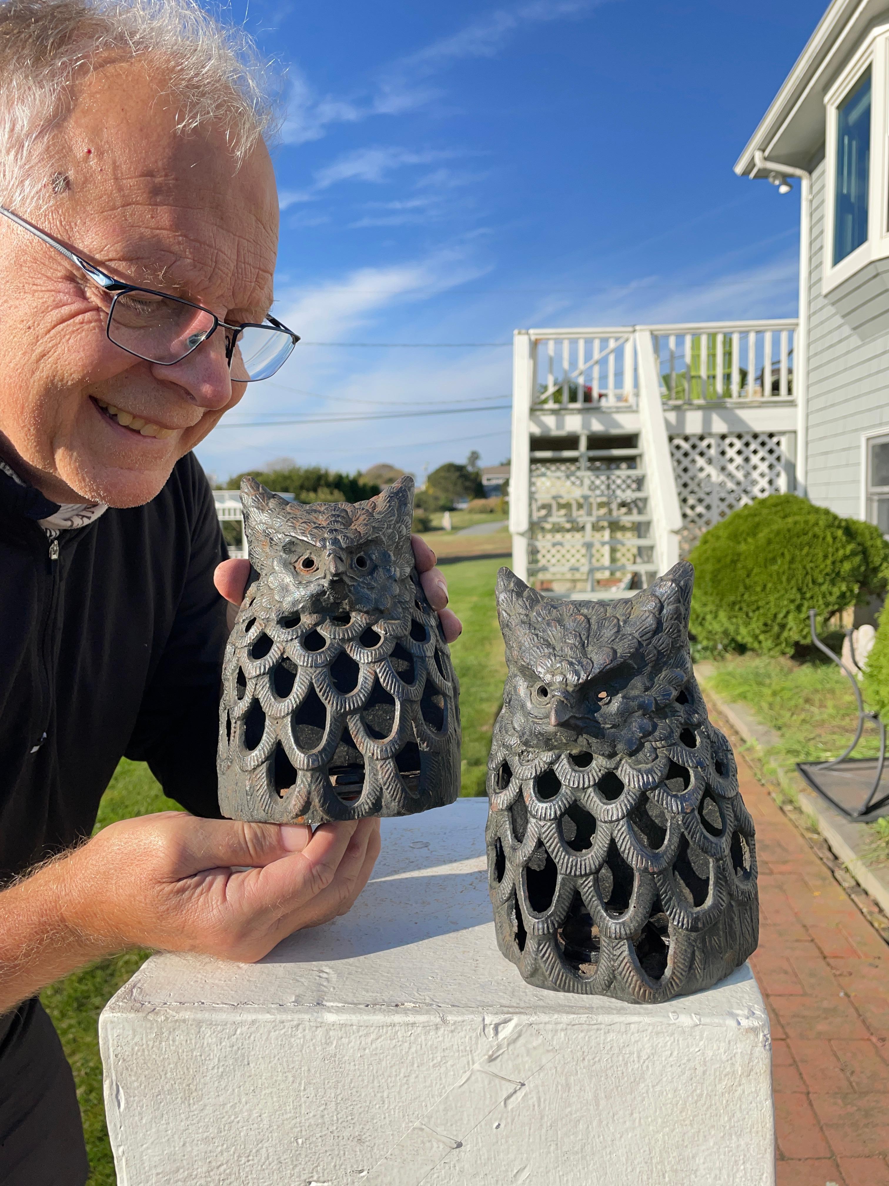 In Japan the owl enjoys a highly venerated status as a symbol of wisdom and fortune. 

This is the first pair (2) we have seen

Japan, an attractive and sturdy antique pair of iron wall lanterns with an 