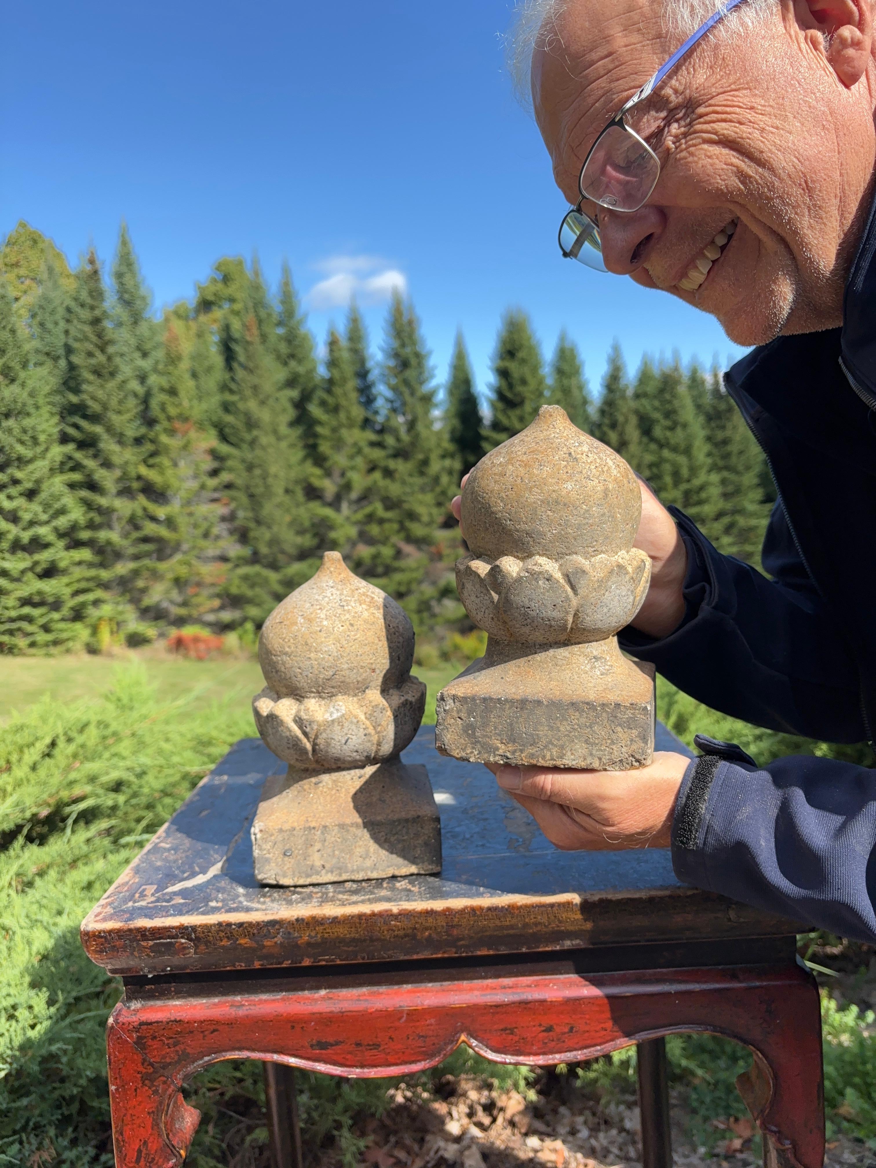 Here's a rare, seldom found pair of old hand carved stone granite Japanese Buddhist temple post or bridge post top giboshi that date in the 19th century, meiji period. They still retain their original old patina which makes them especially