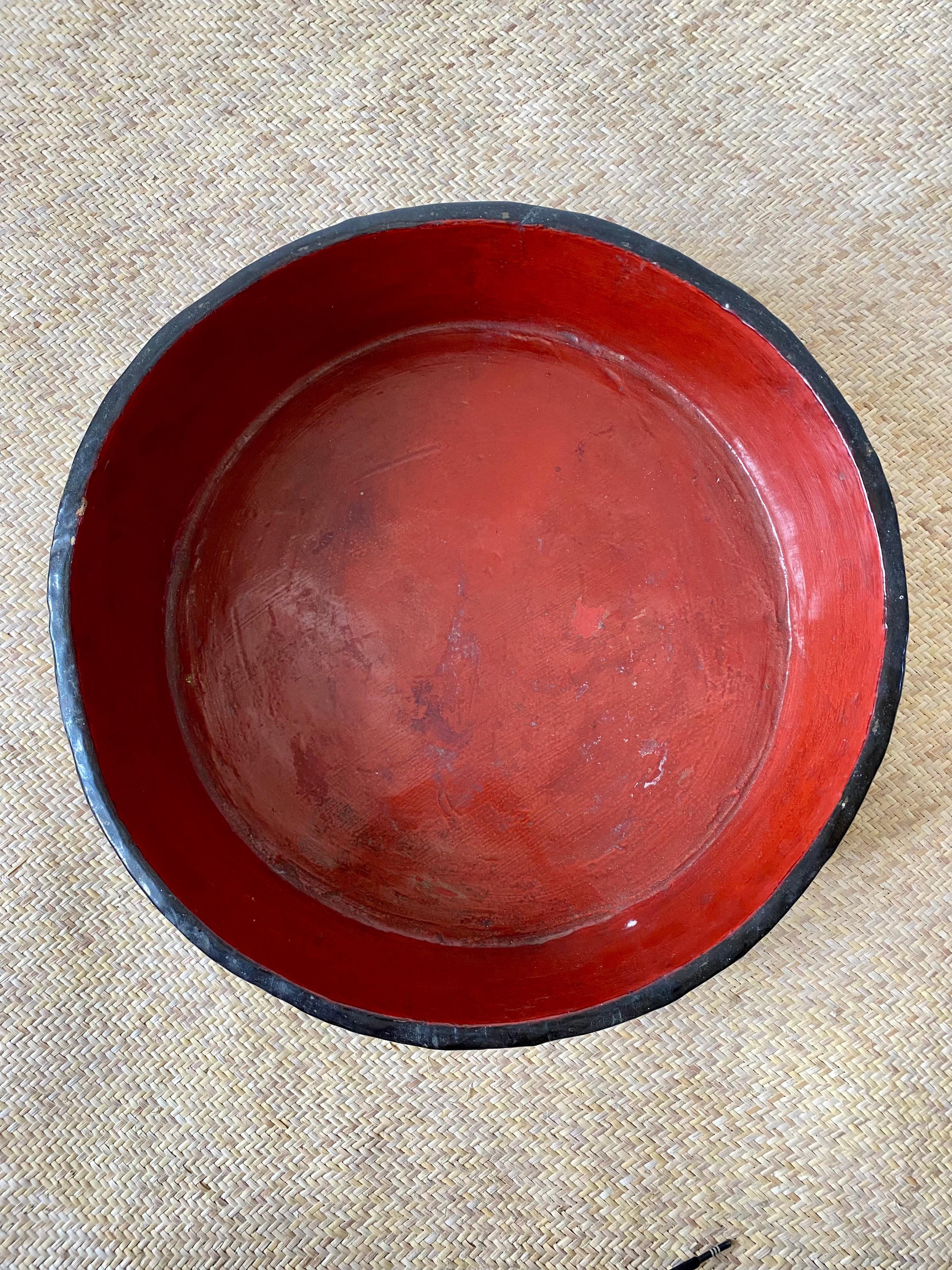red wooden bowl
